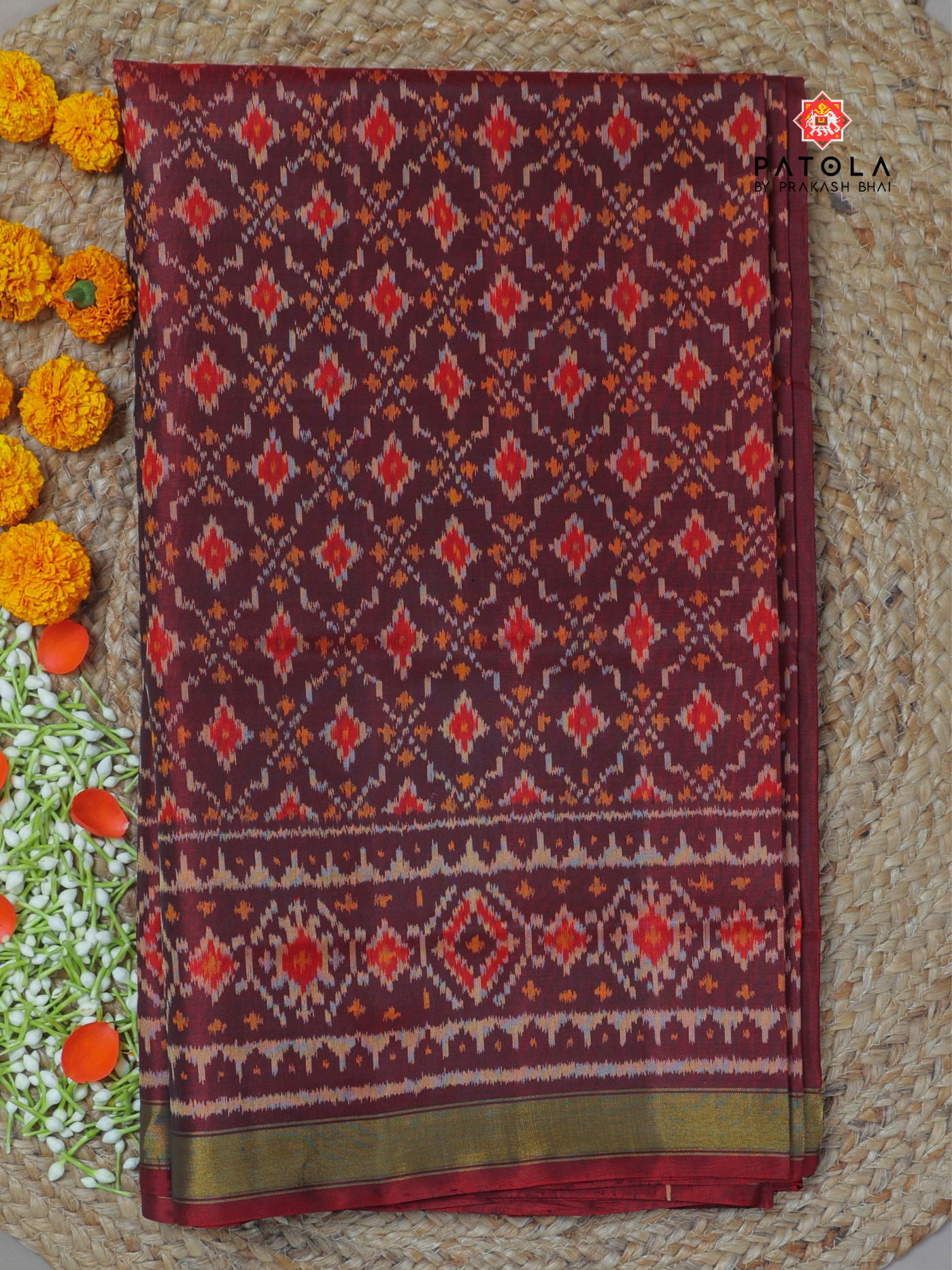 Button phool design with Small Tissue Border single ikat patola saree