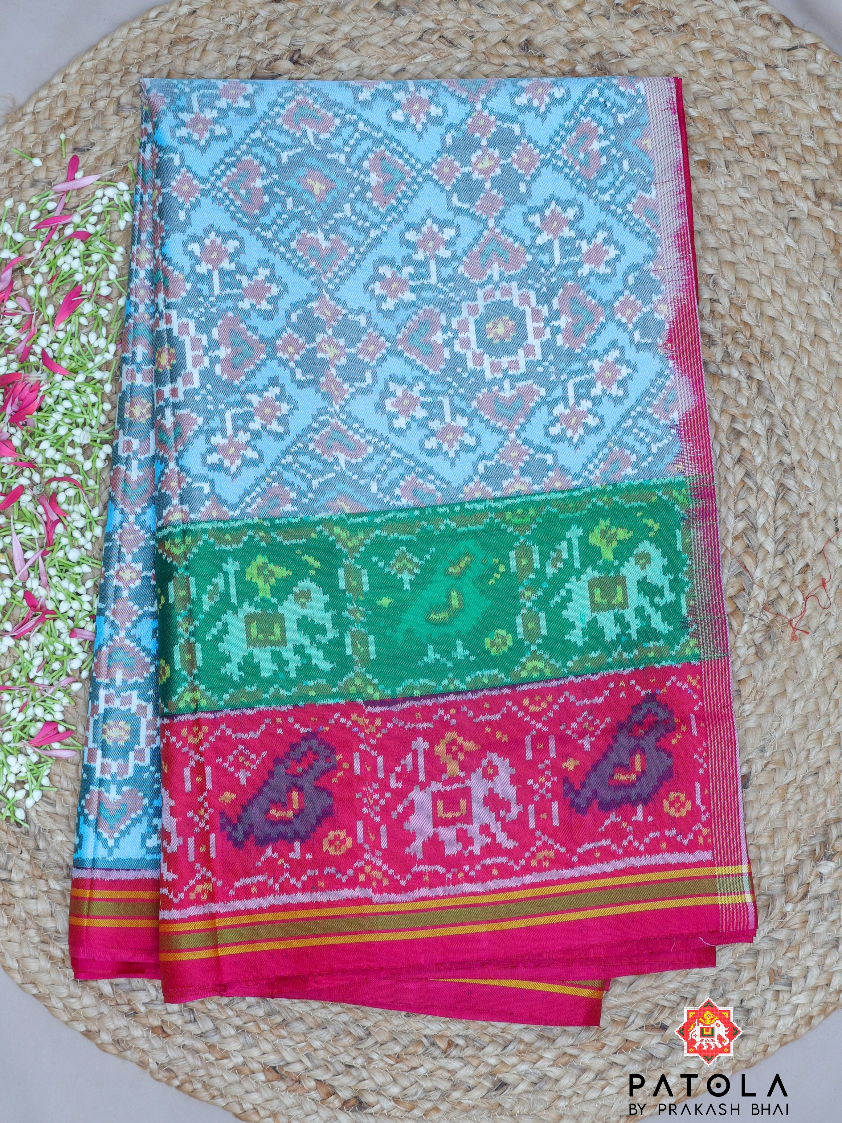 Navratna Pan Chanda Mix Design With Two Colors Border Semi Double Ikat Patola Saree