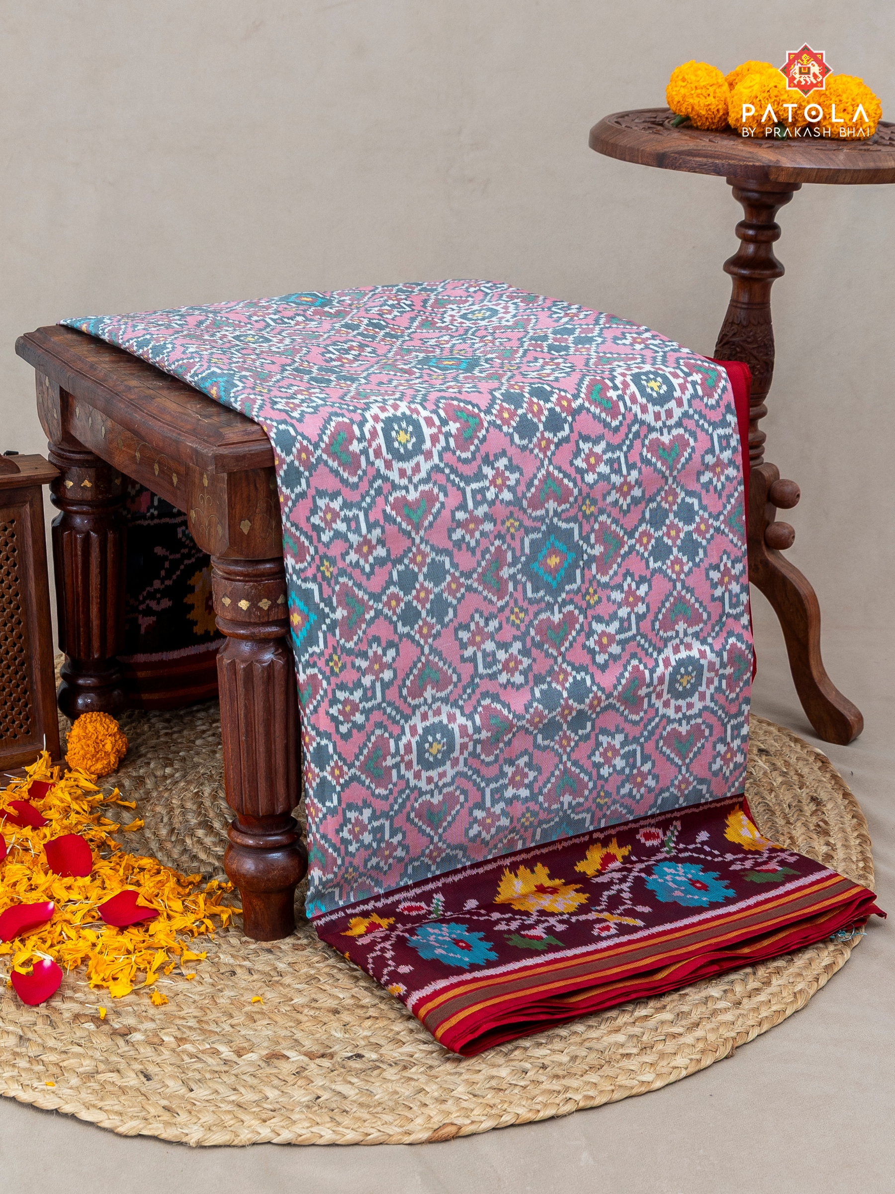 Navratna with manek chowk designer semi double ikat patola saree