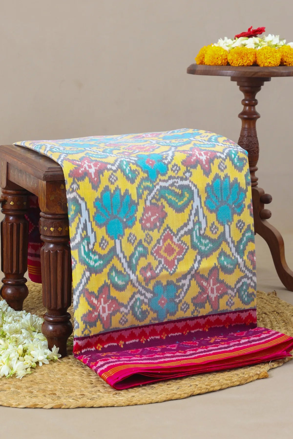 Rangoli design with pallu border contras semi double ikat patola saree