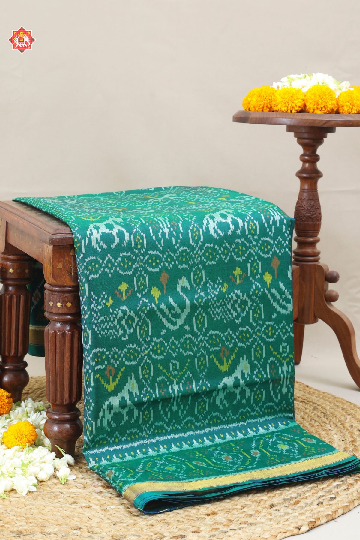 Motif design small tissue border single ikat patola saree