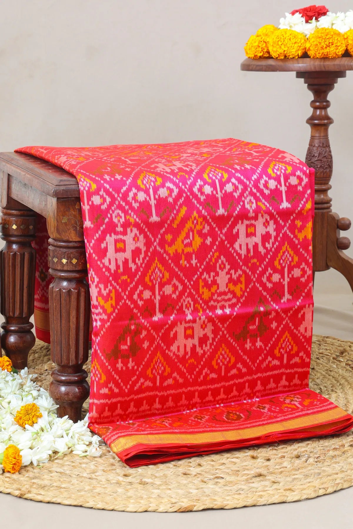 Nari kunjar design small tissue single ikat patola saree