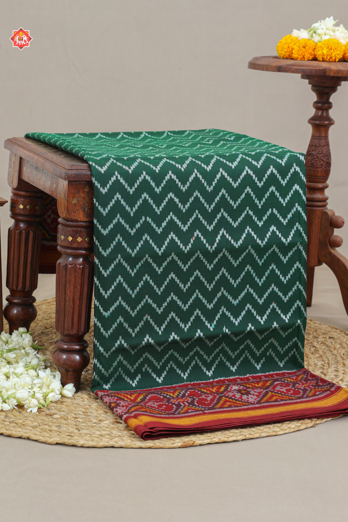 Zigzag design with border traditional design semi double ikat patola saree