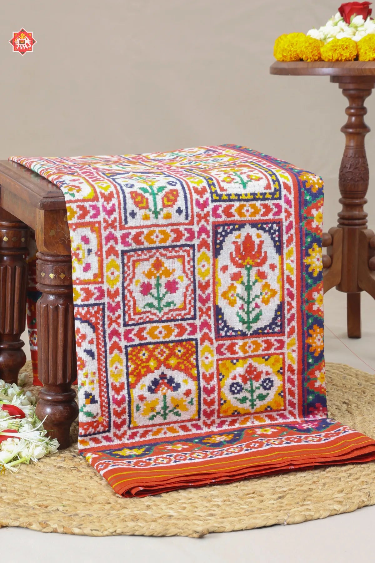 Signature piece patan patola silk double ikat jharokha design off white saree