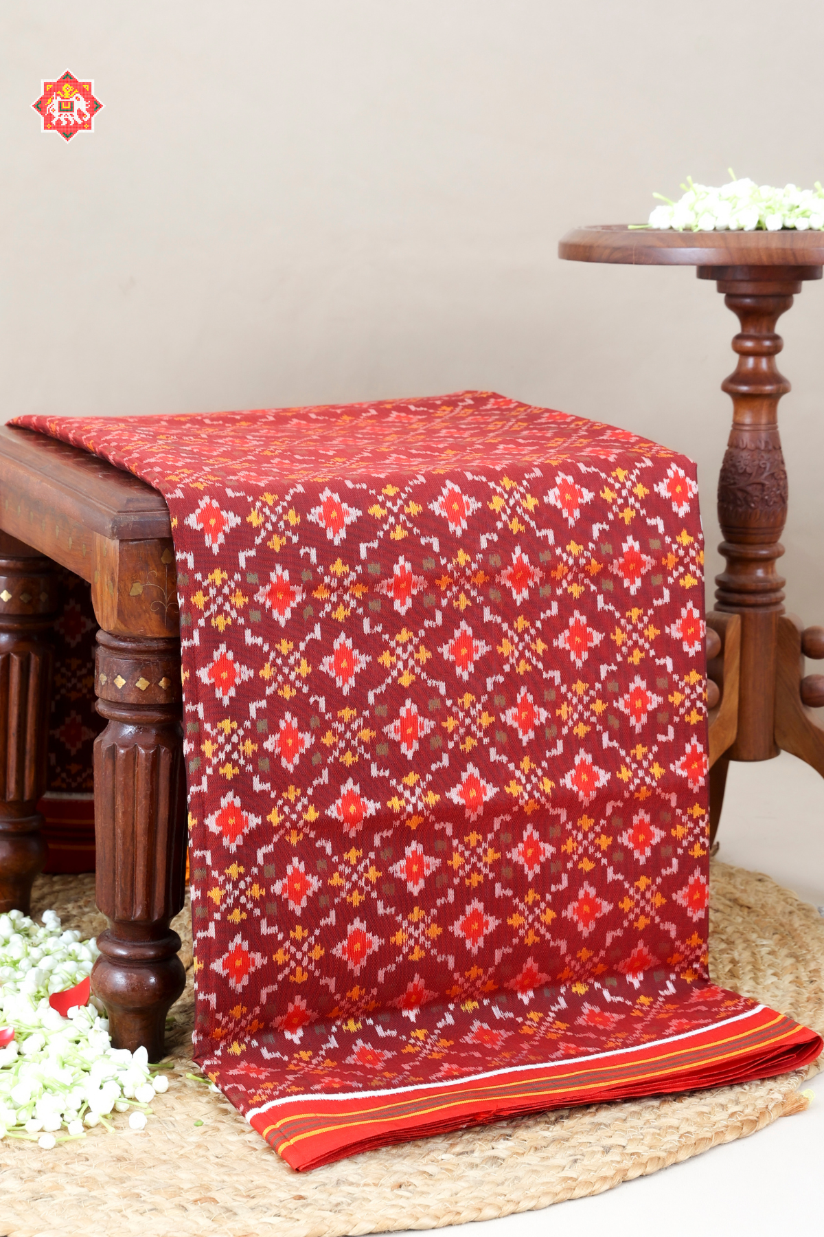 Treditional button full design small border semi double ikat patola saree