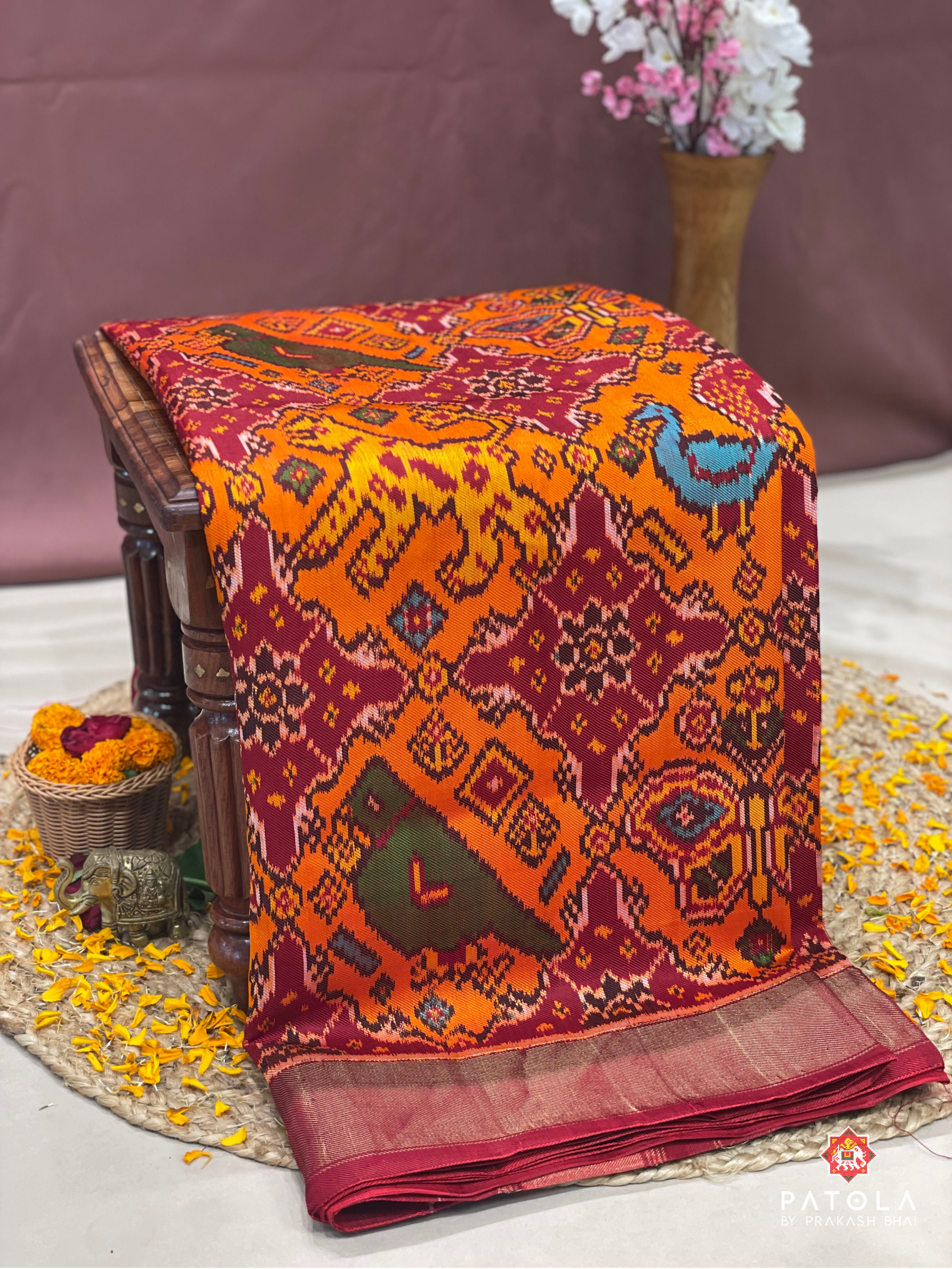 4 Figures With Chhabdi Designer Twill Patola Saree