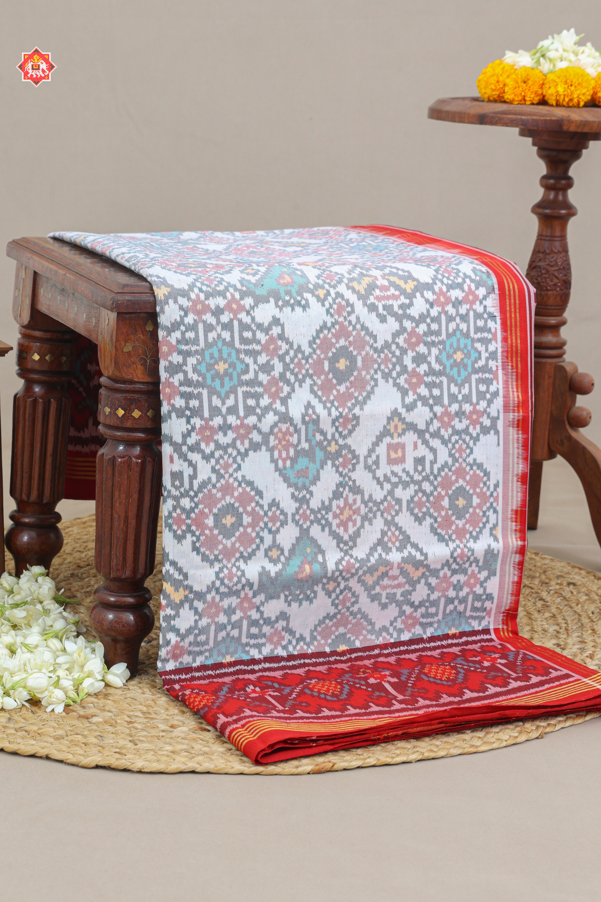 Navratna design with elephant design semi double ikat patola saree
