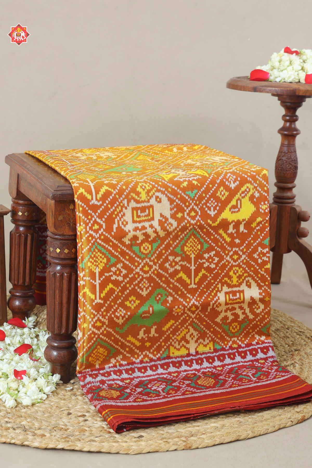 Traditional adtala design pallu border semi double ikat patola saree
