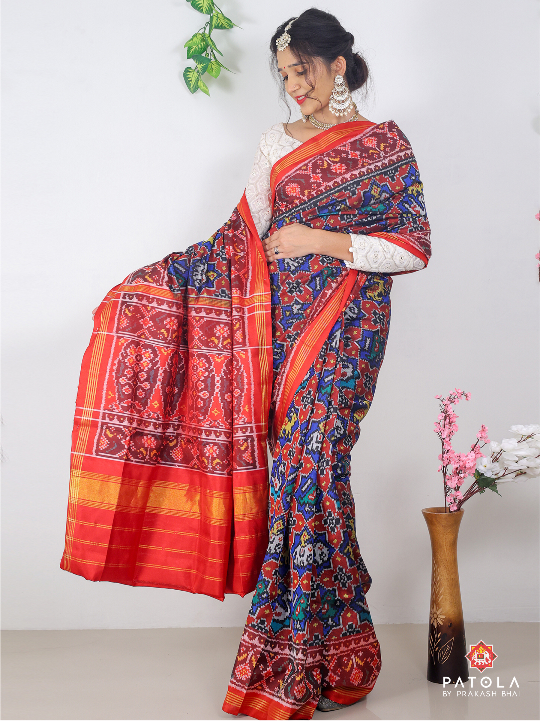 Figures With Star Designer Semi Double Ikat Patola Saree