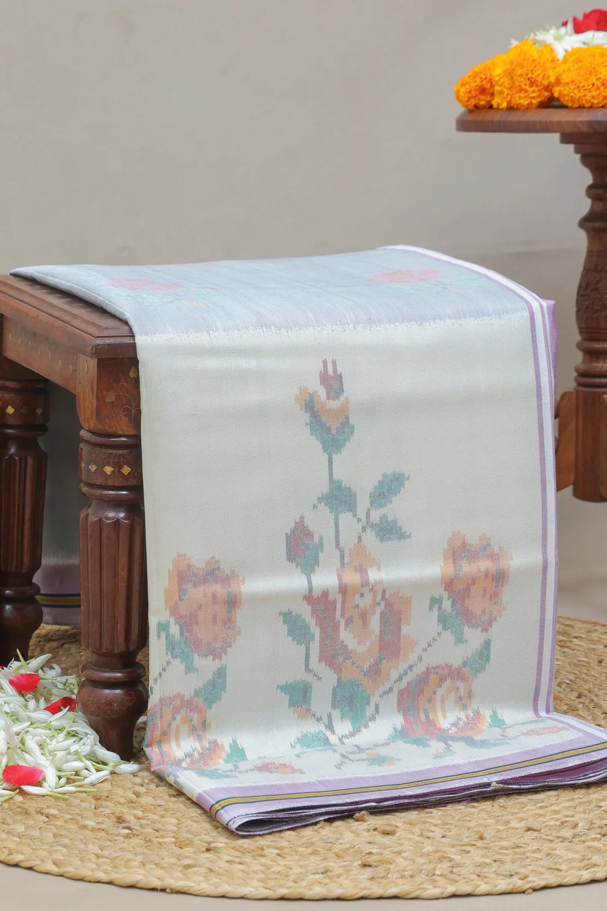Masterpiece suct border with flower design pallu semi double ikat patola saree
