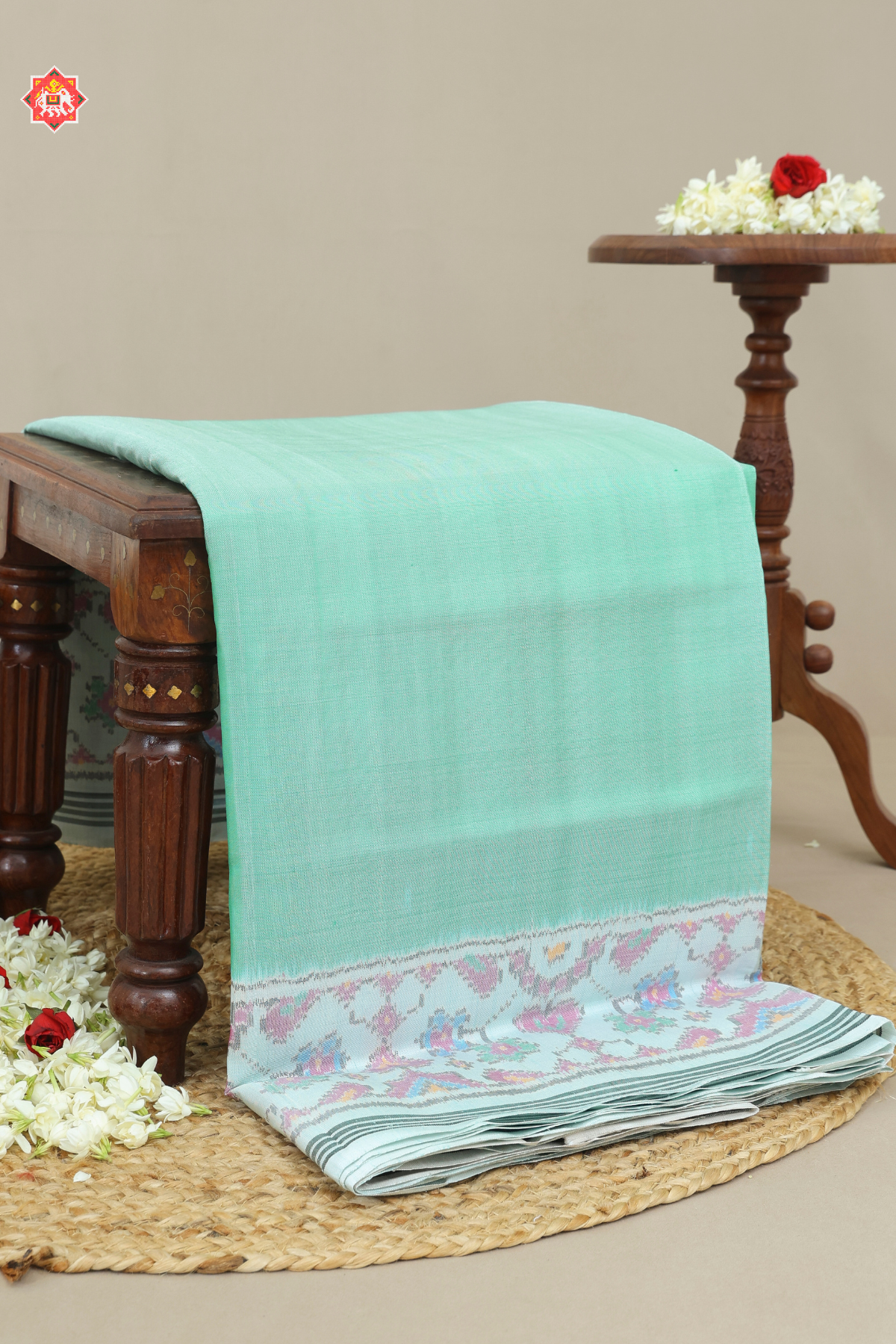 Plain pista with off-white navratna manek chowk border & blouse patola design semi double ikat patola saree