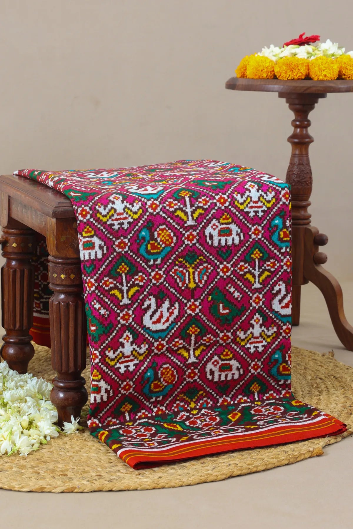Patan patola tradtional nari kunjar with flower border pure double ikat saree