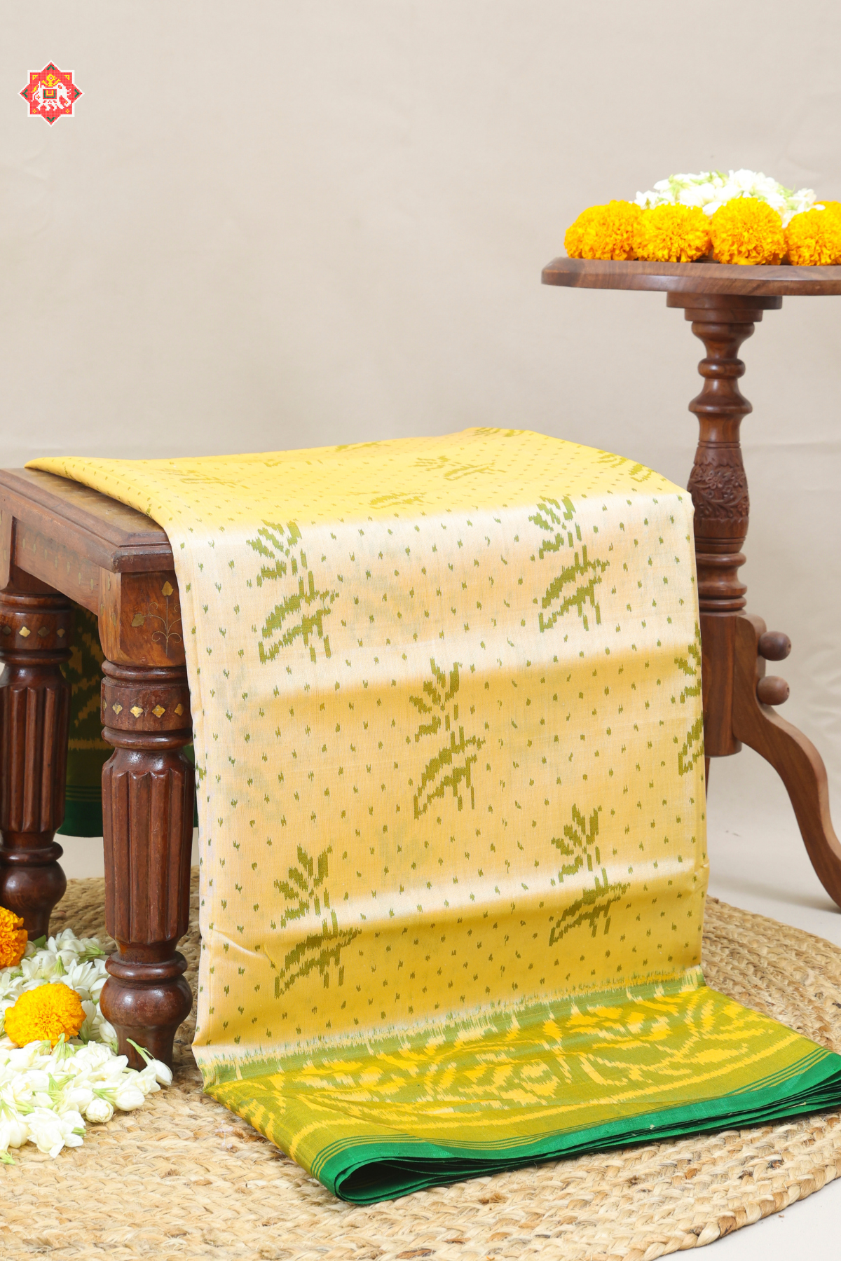 Fancy flowers design with small dots & without tissue border single ikat patola saree