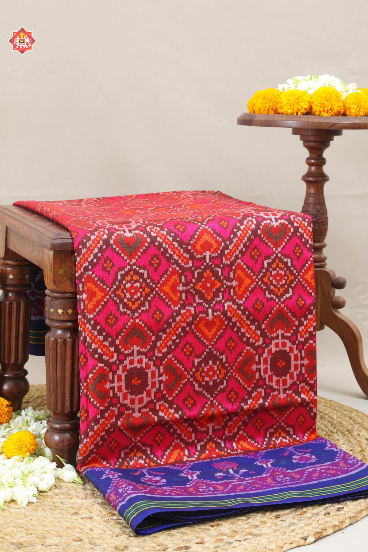 Traditional manek chowk design with ghughroo border Semi double ikat patola saree