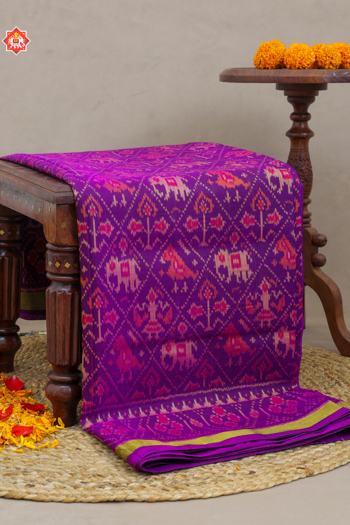 Traditional narikunj design small tissue border Single Ikat Patola Saree