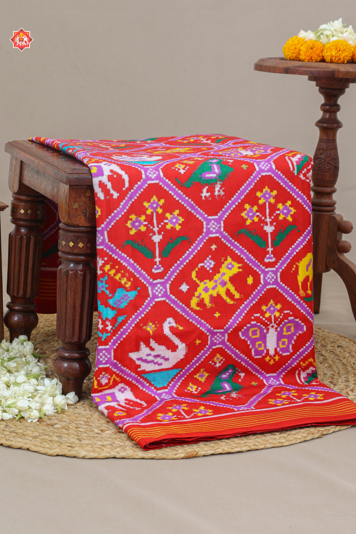 Adtala design with traditional flower design pallu pure double ikat patola saree