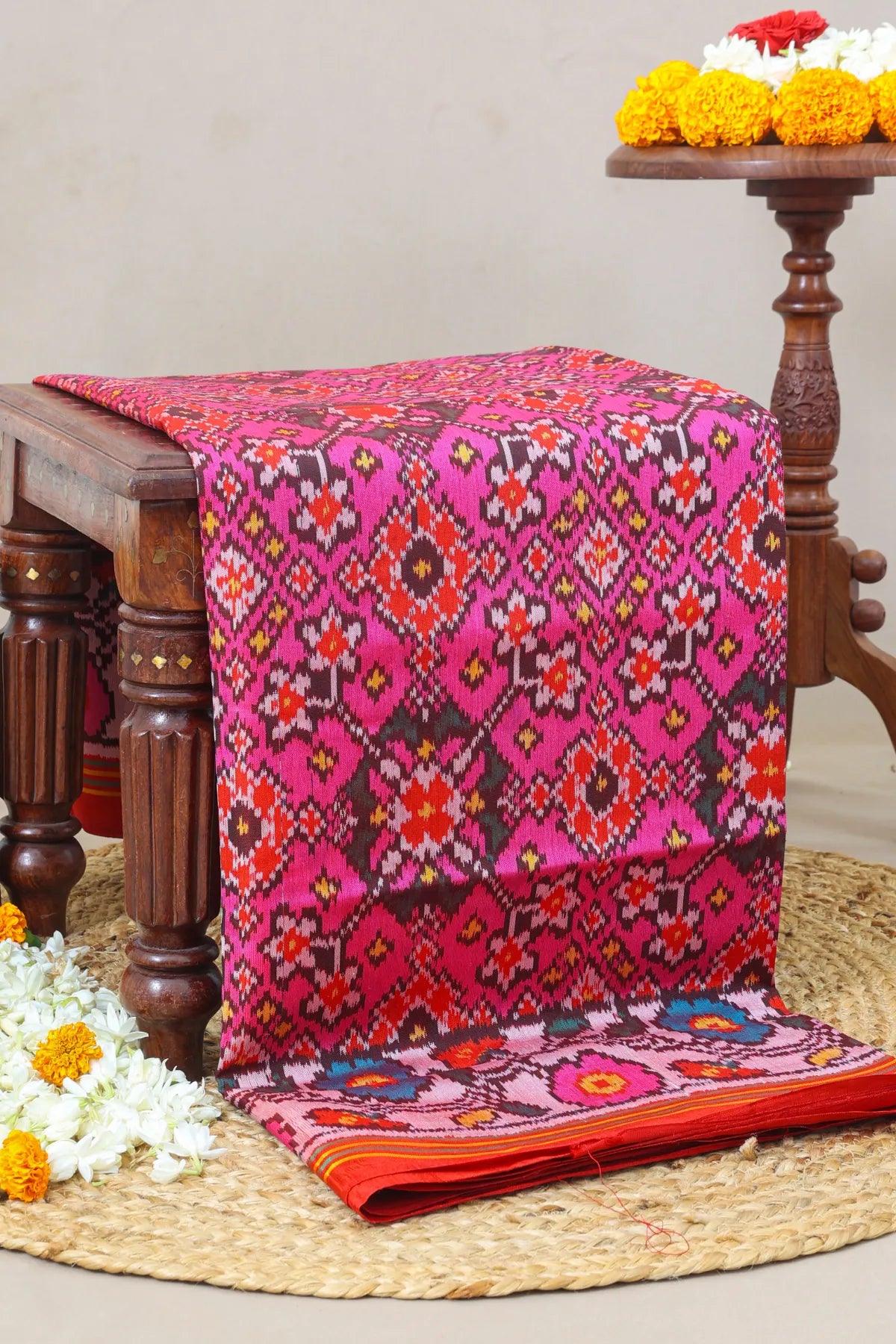 Navratna design with flowers border semi double ikat patola saree