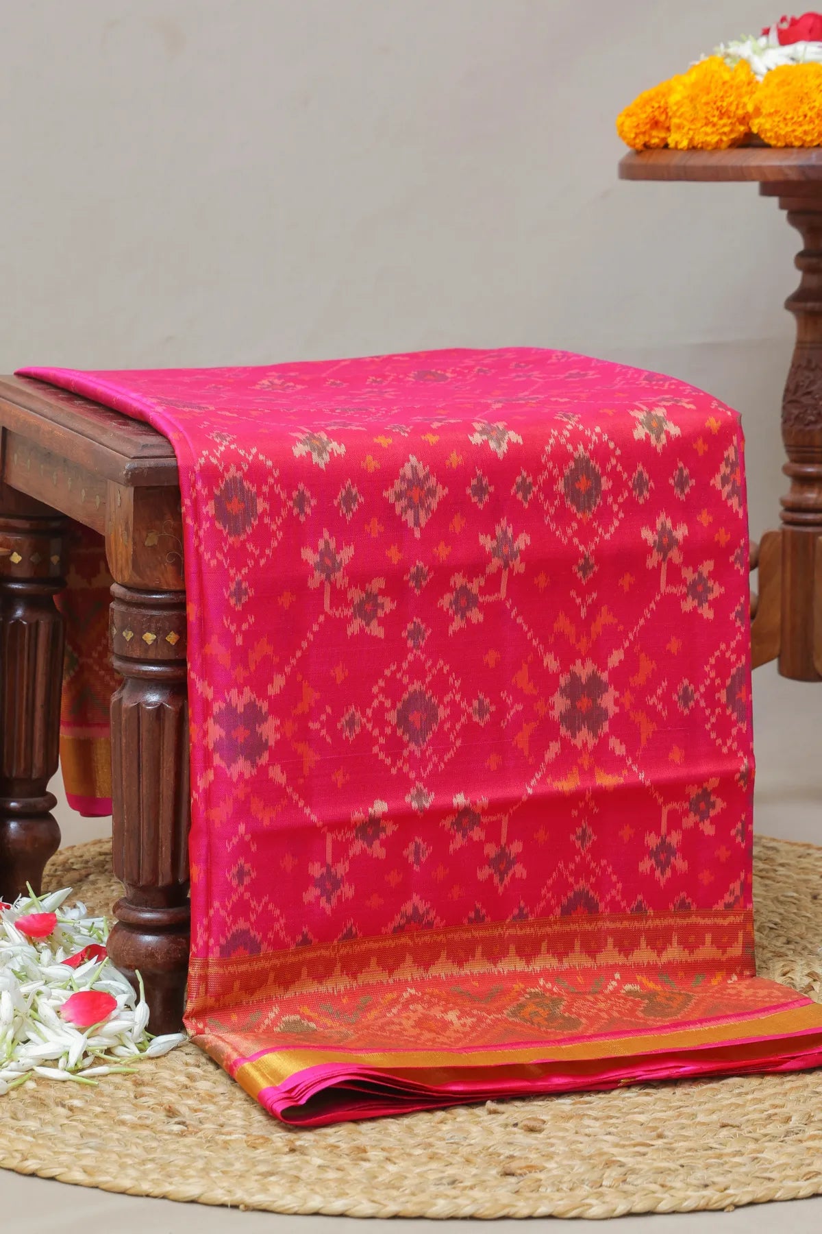 Navrtana design with tissue border single ikat patola saree