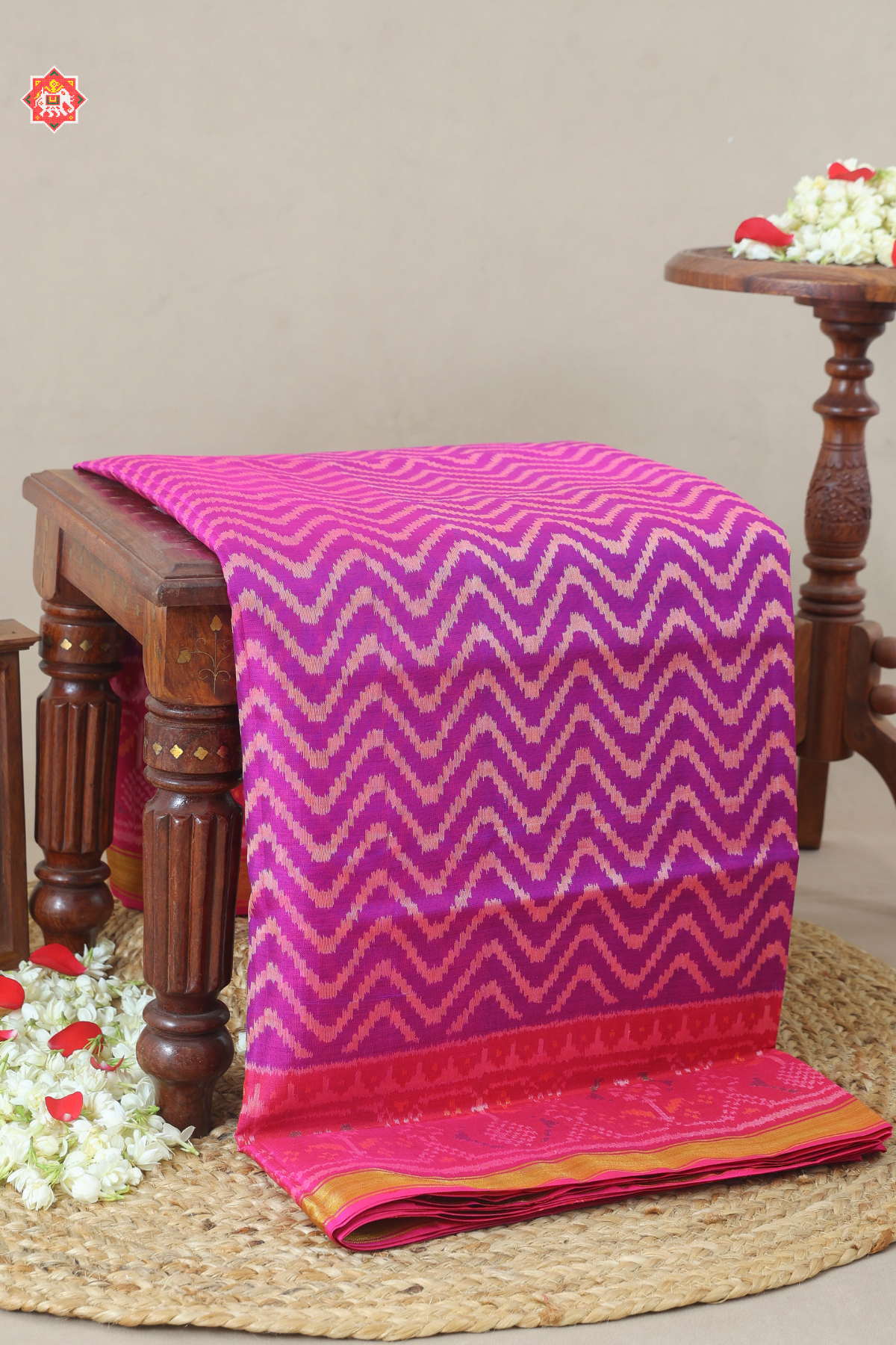 Zig-zag design with ghooghro border single ikat patola saree