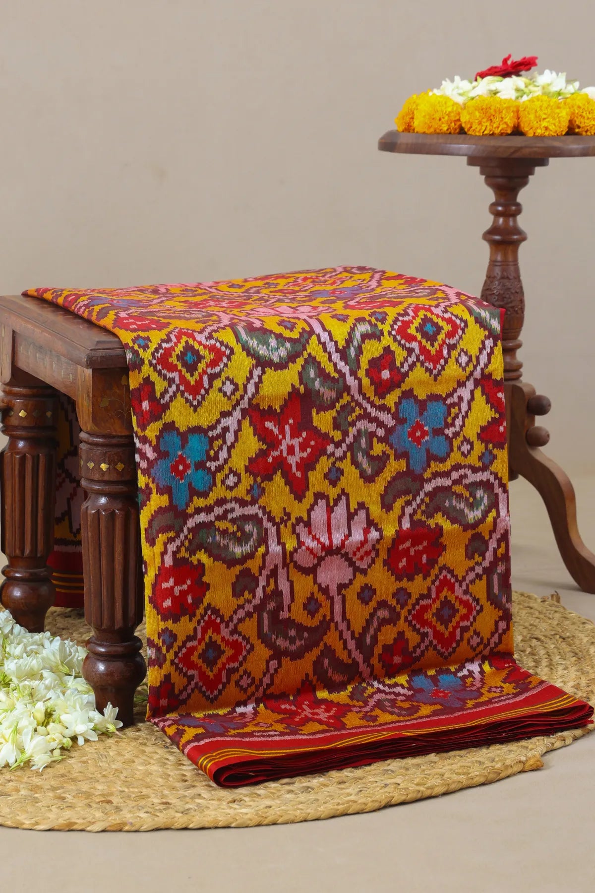Rangoli design with lines border traditional design  pallu semi double ikat patola saree