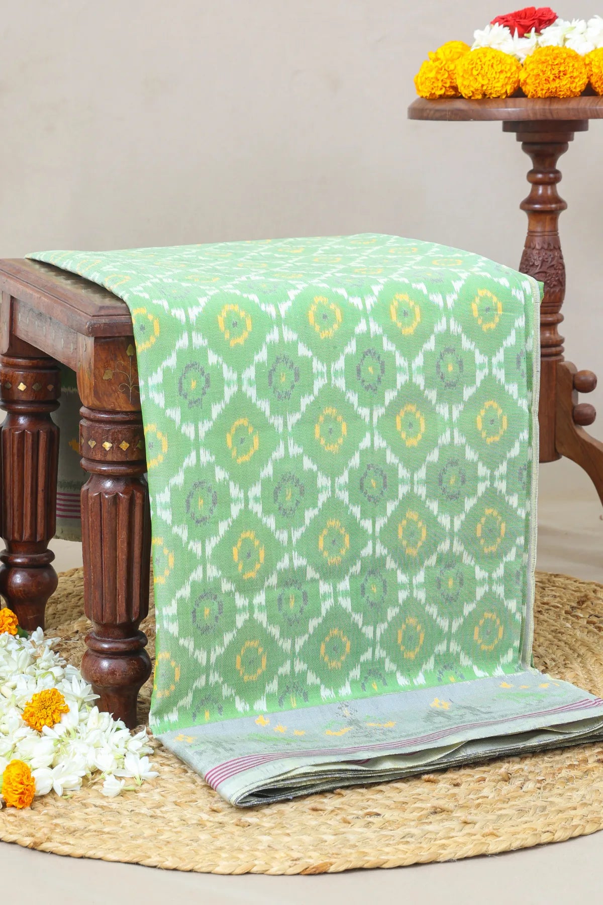 Fancy flower design with motifs design pallu border semi double ikat patola saree