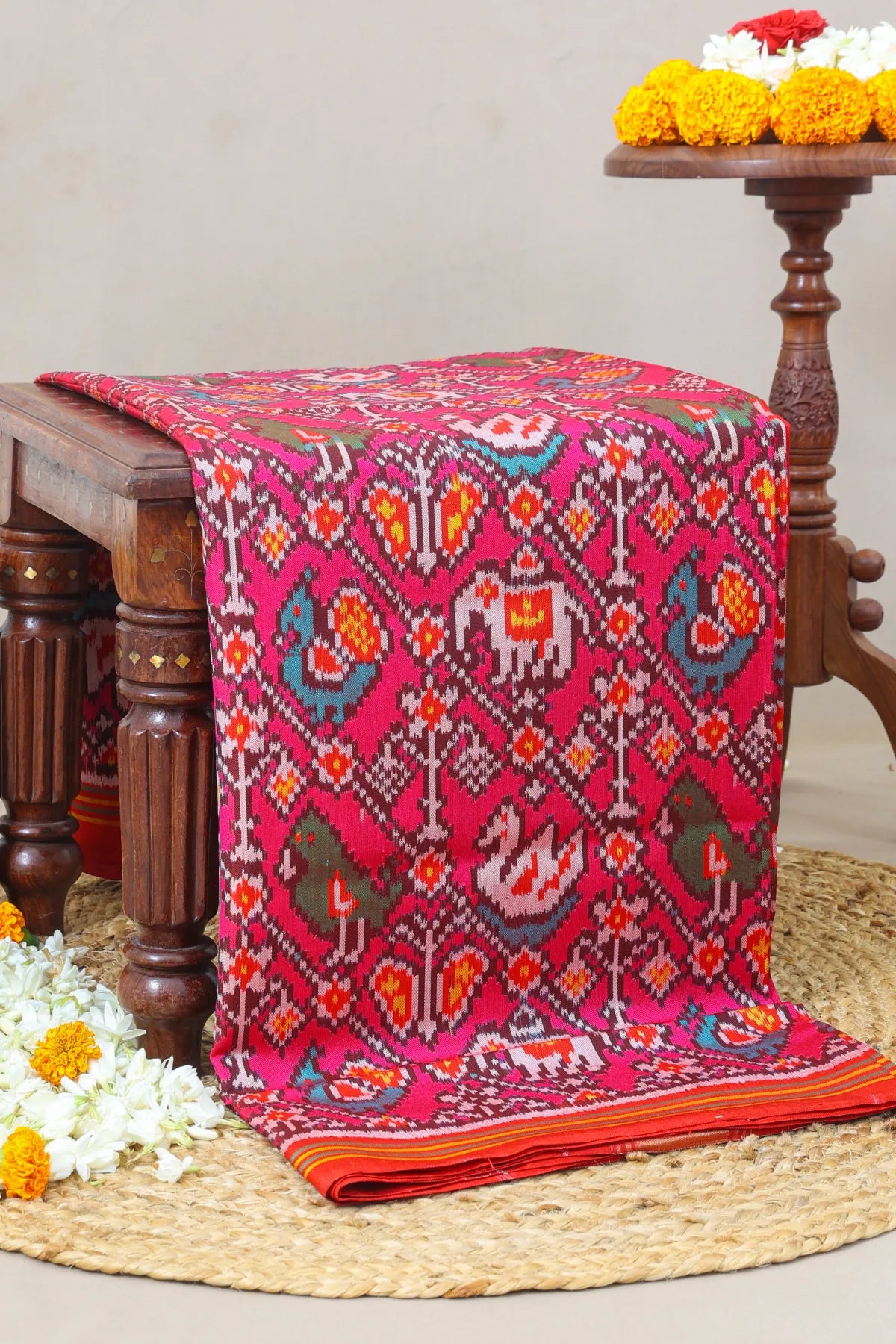 Cross laheriya with motifs design semi double ikat patola saree
