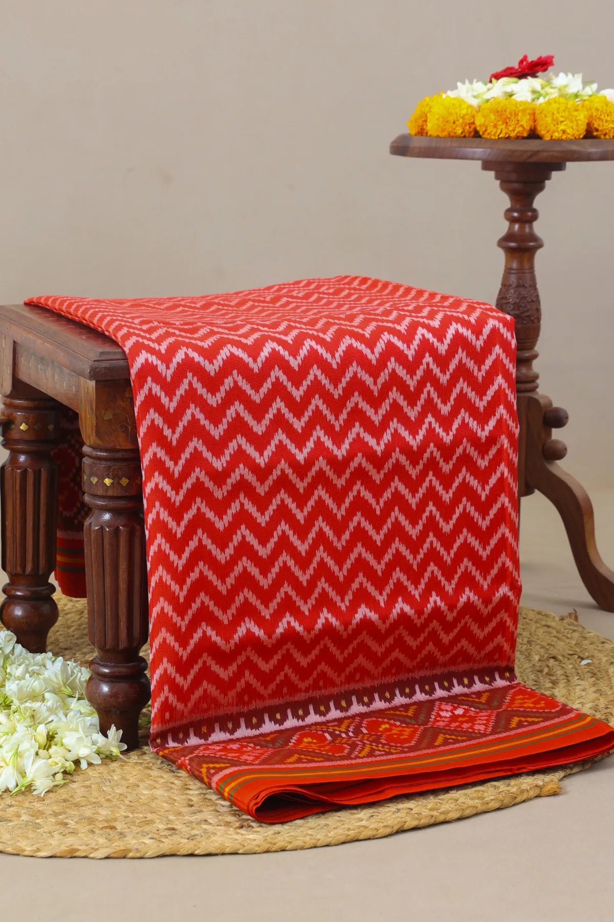 Zig-zag with pallu border flower design semi double ikat patola saree