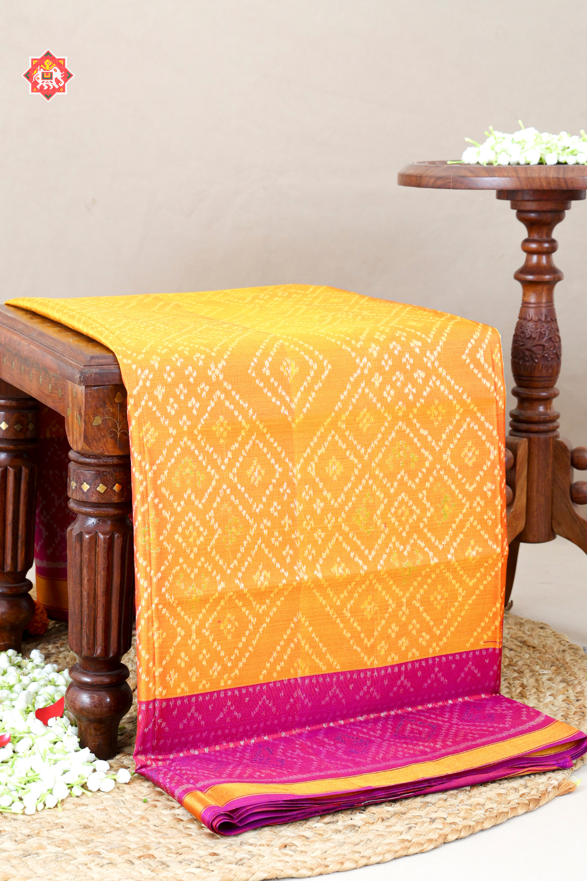 Bandhani design with small tissue border design single ikat patola saree