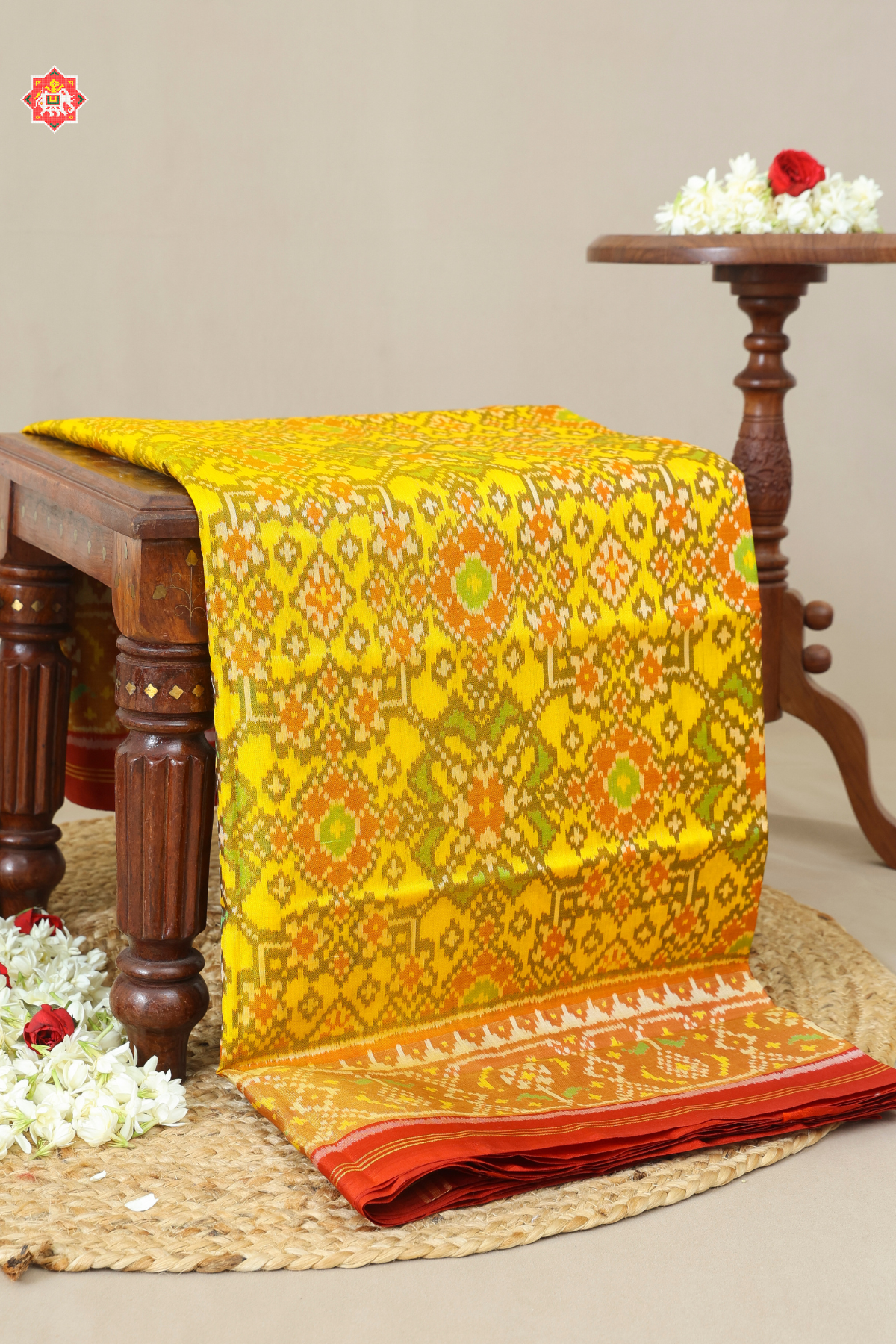 Traditional navratna design with minakari work tissue border single ikat patola