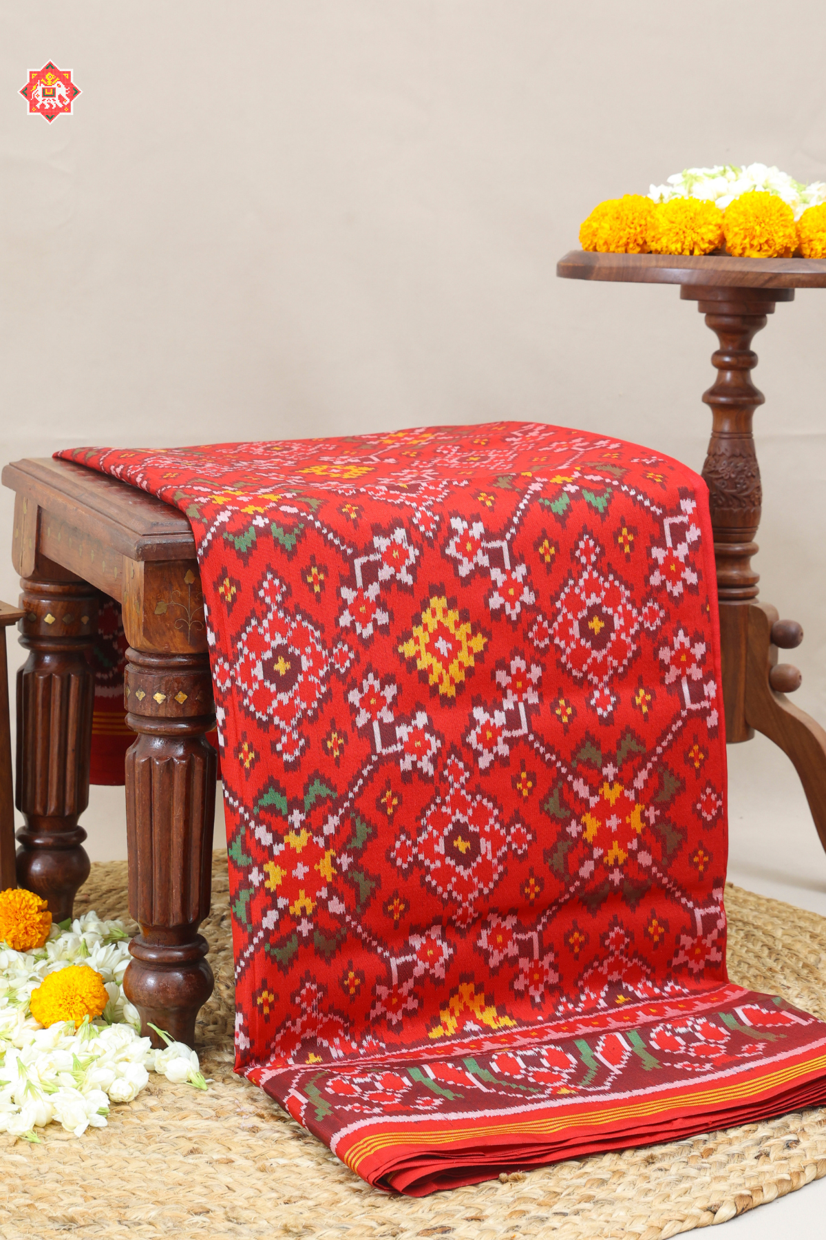 Traditional navratn design with minakari work pallu border self semi double ikat patola saree
