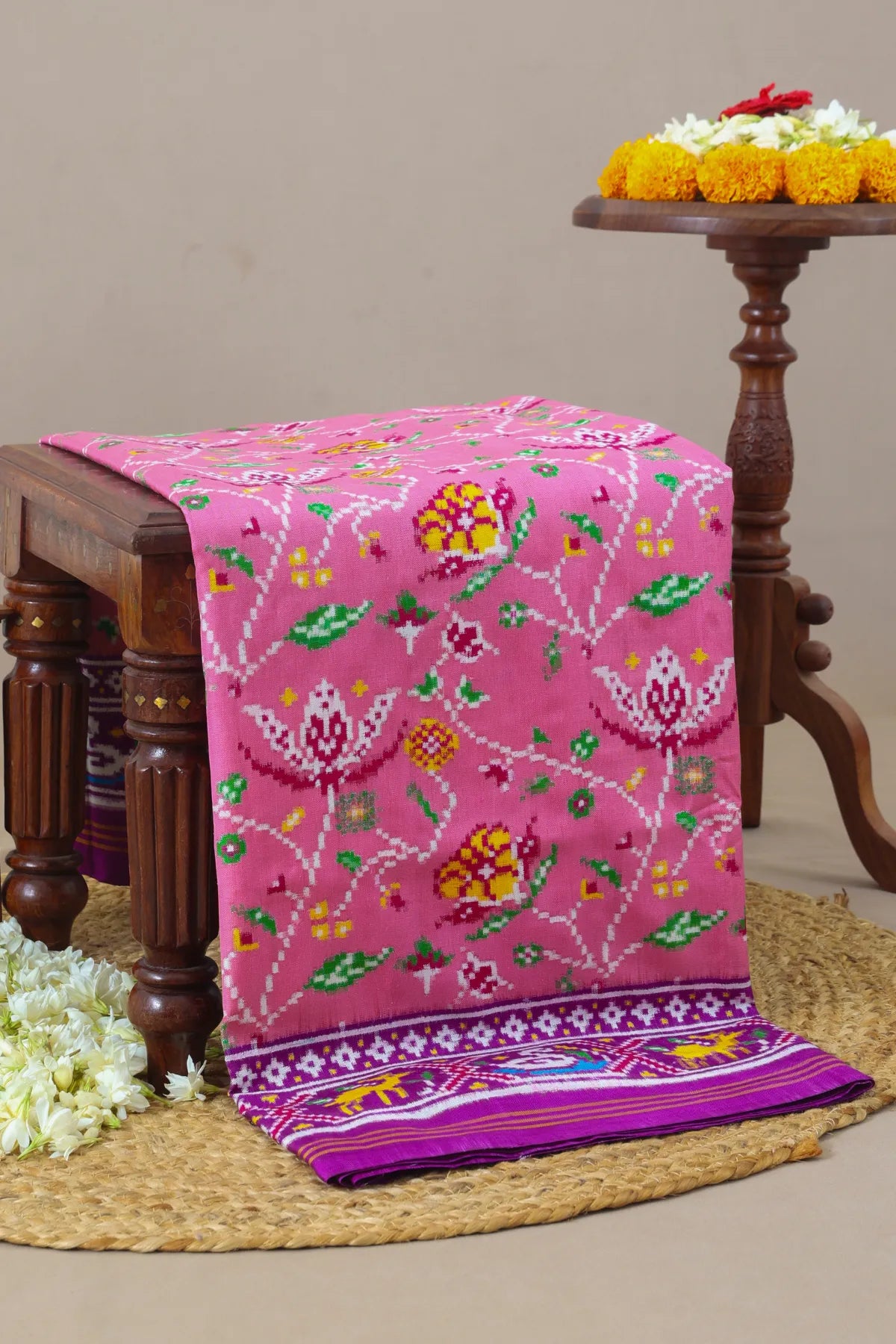 Patan patola traditional master piece rangoli design with border pallu motif design double ikat saree