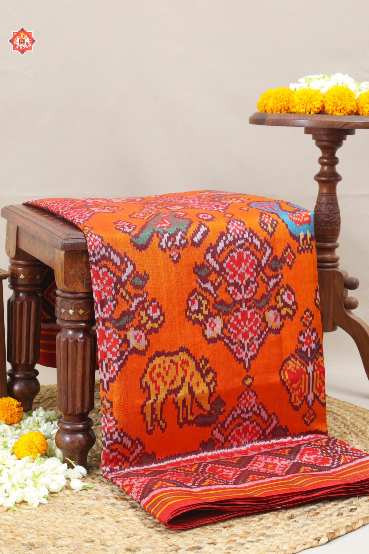 Master piece flower & motif design semi double ikat patola saree
