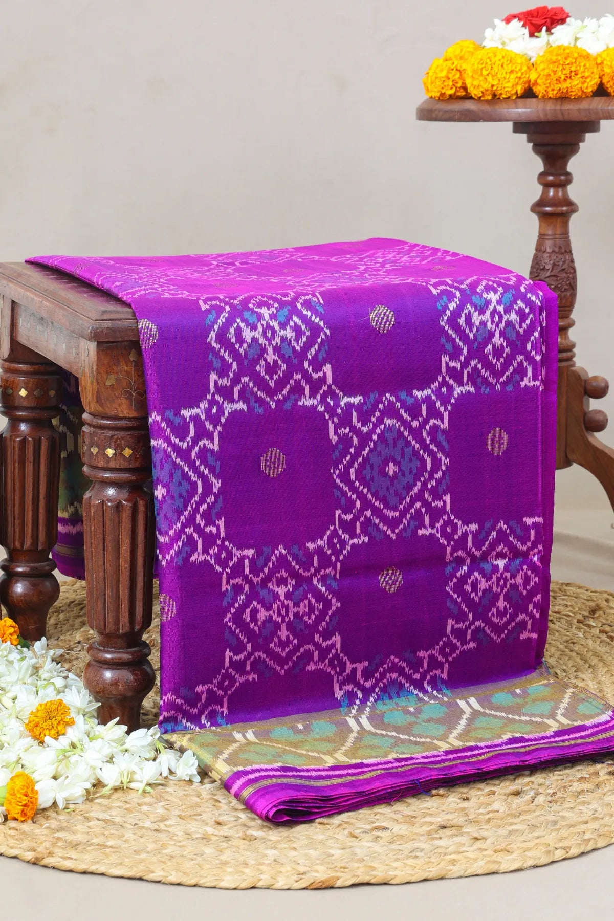 Zig-zag with traditional motifs design border single ikat patola saree