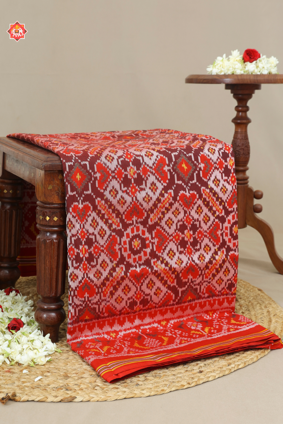 Manek chowk design with ghughroo border semi double ikat patola saree