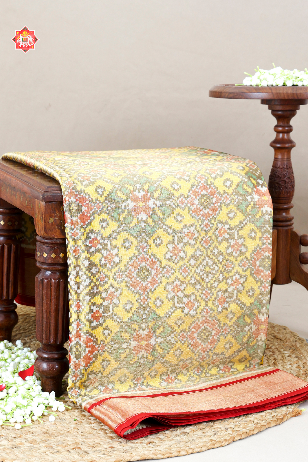 Navratna design with plain border tissue patola saree