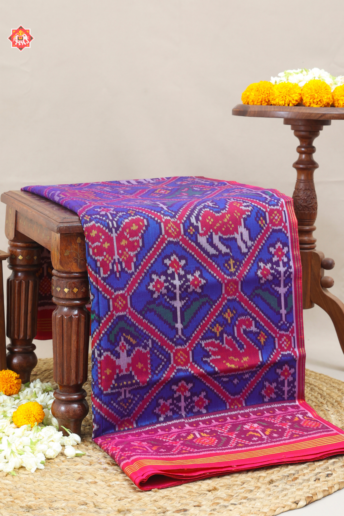 Traditional adtala design with pallu border contras semi double ikat patola saree