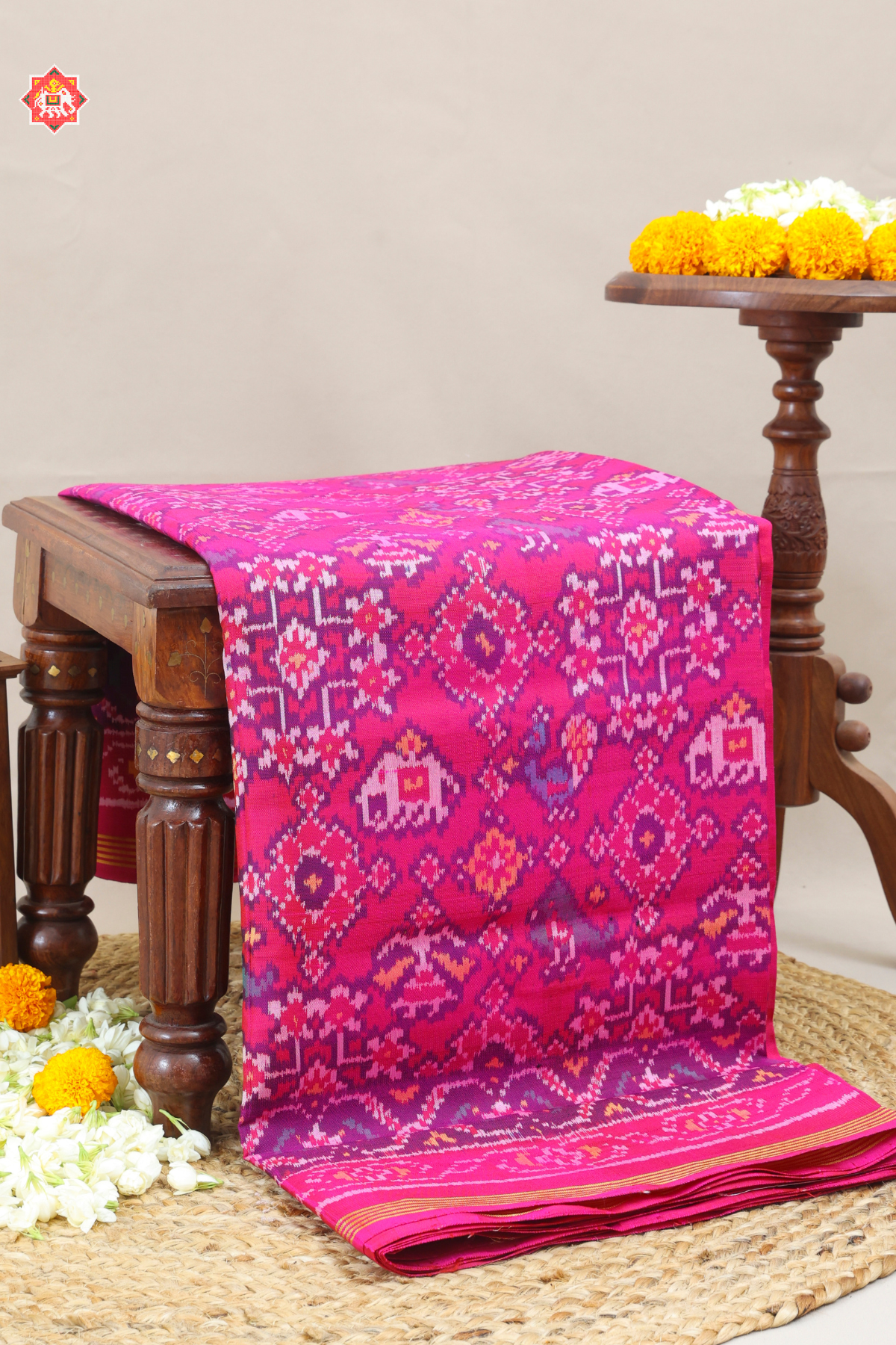 Traditional navratn design with small motif design semi double ikat patola saree
