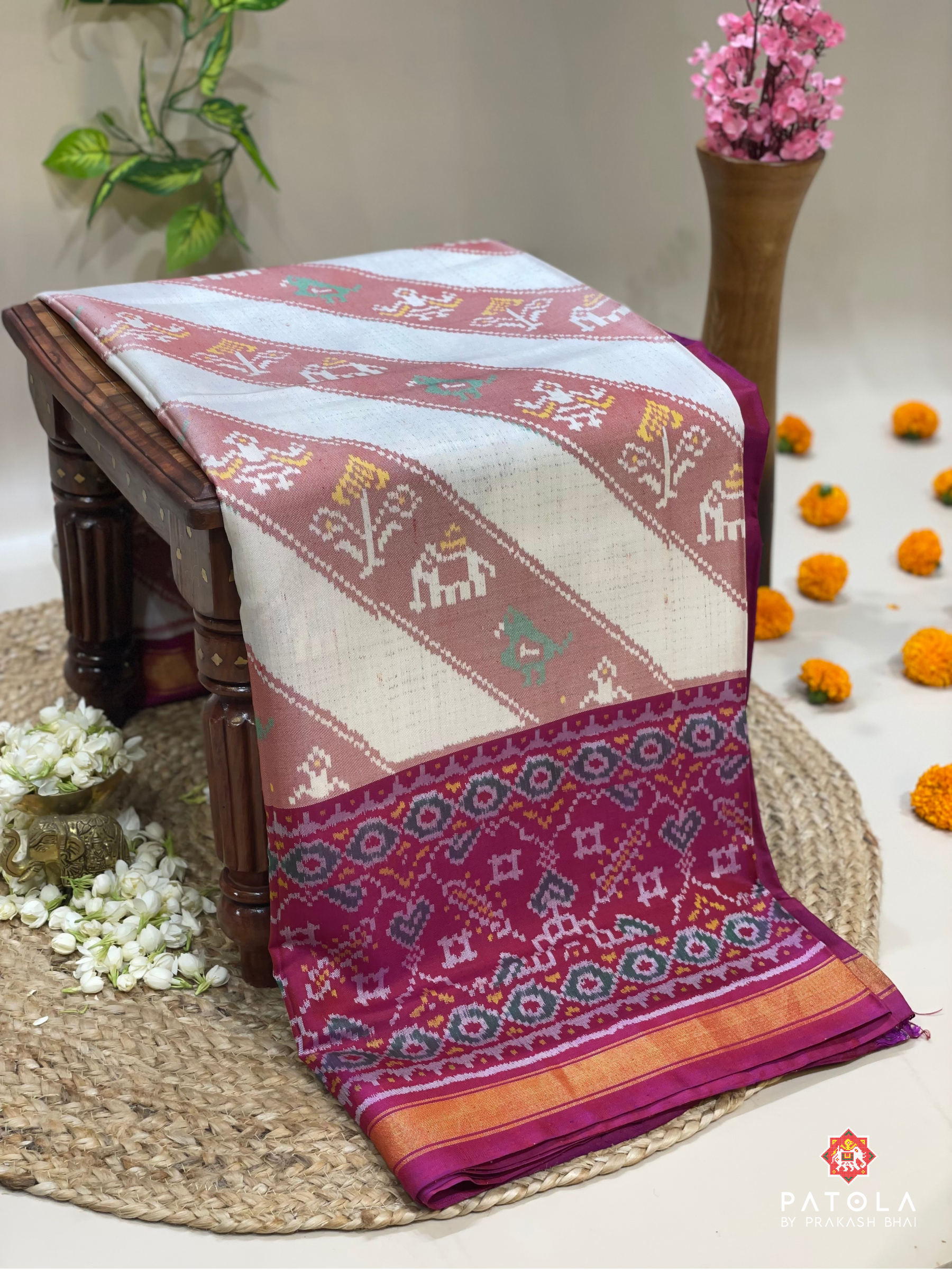 Manekchowk Scut Boder Semi Double Ikat Patola Saree