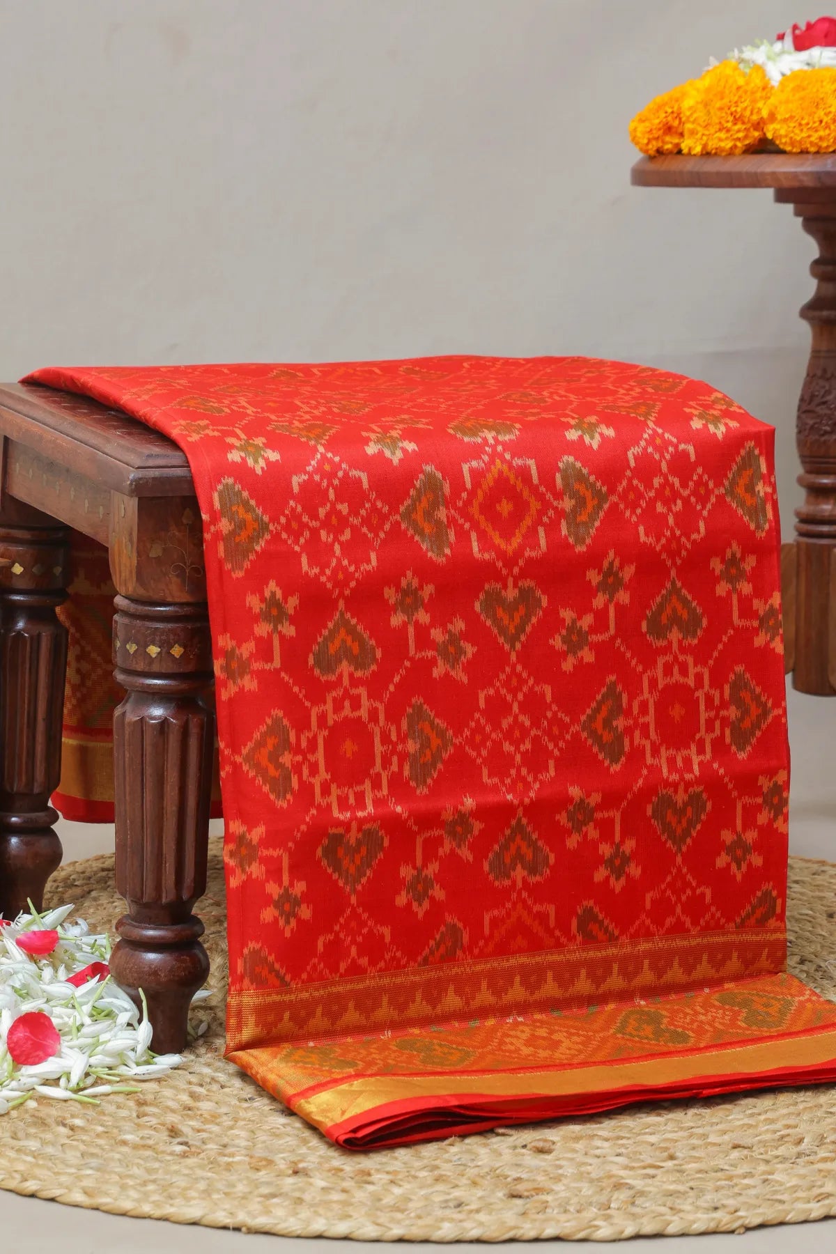 Paan chanda design with tissue border single ikat patola saree
