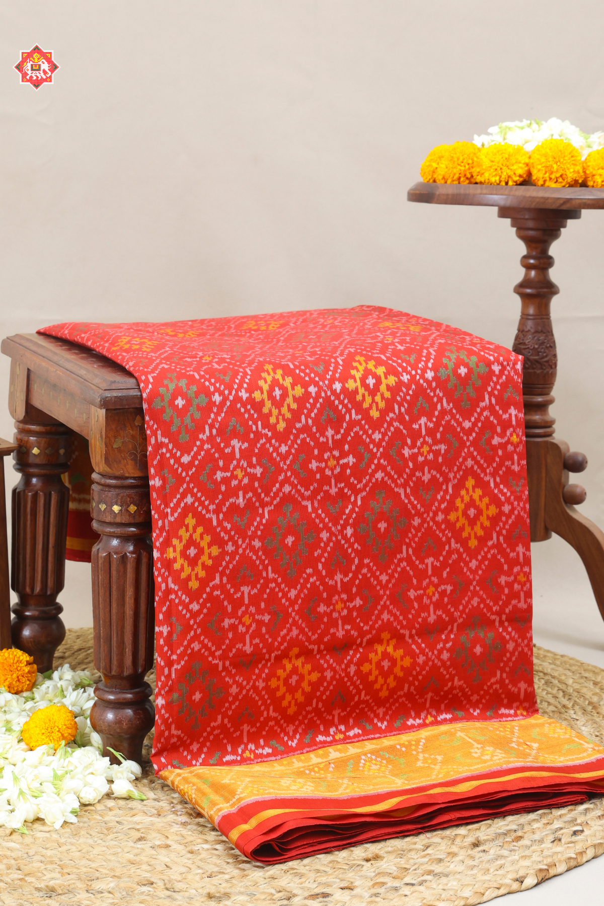 Paan chanda design with tissue border single ikat patola saree