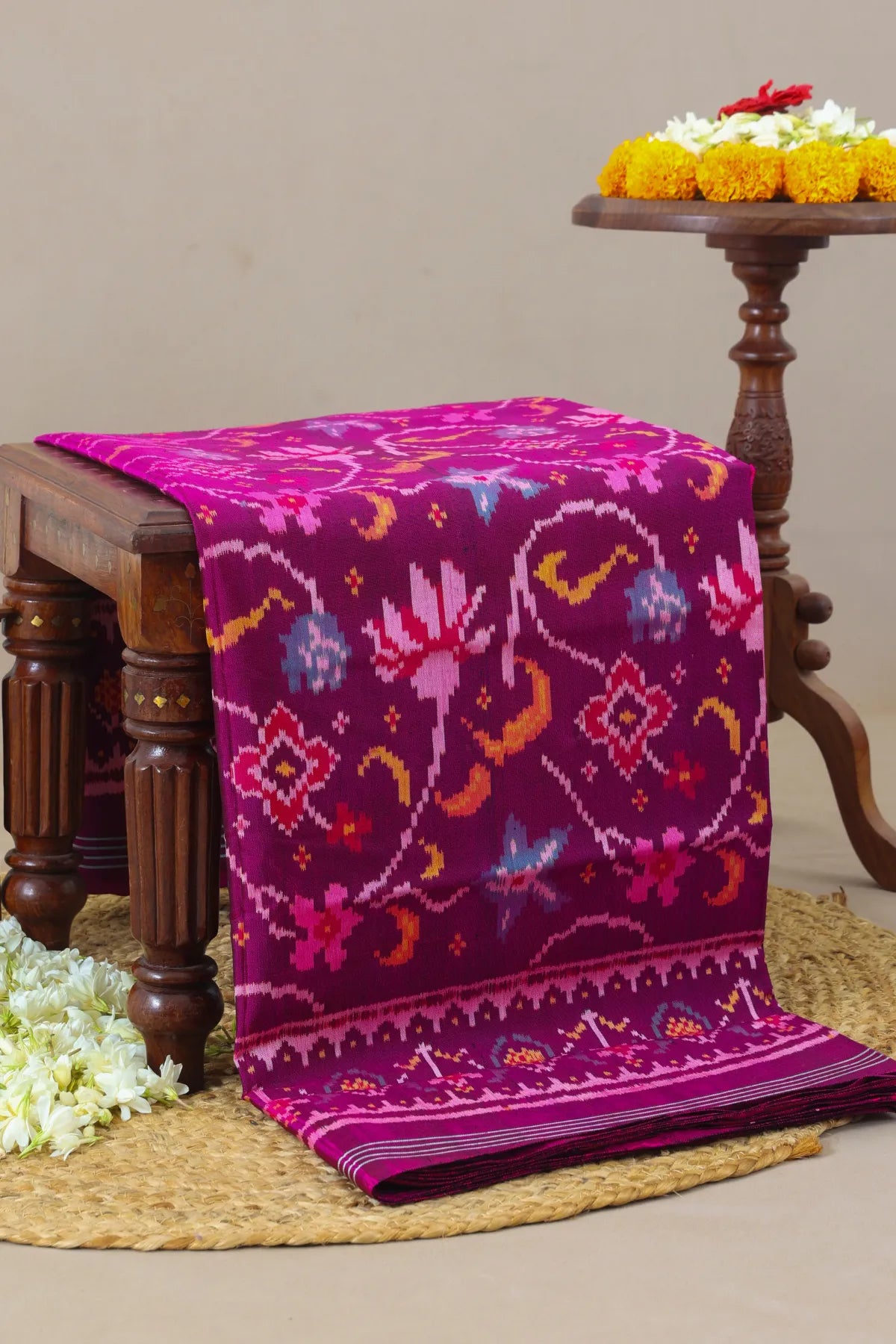 Rangoli design with lines border traditional deisgn pallu semi double ikat patola saree