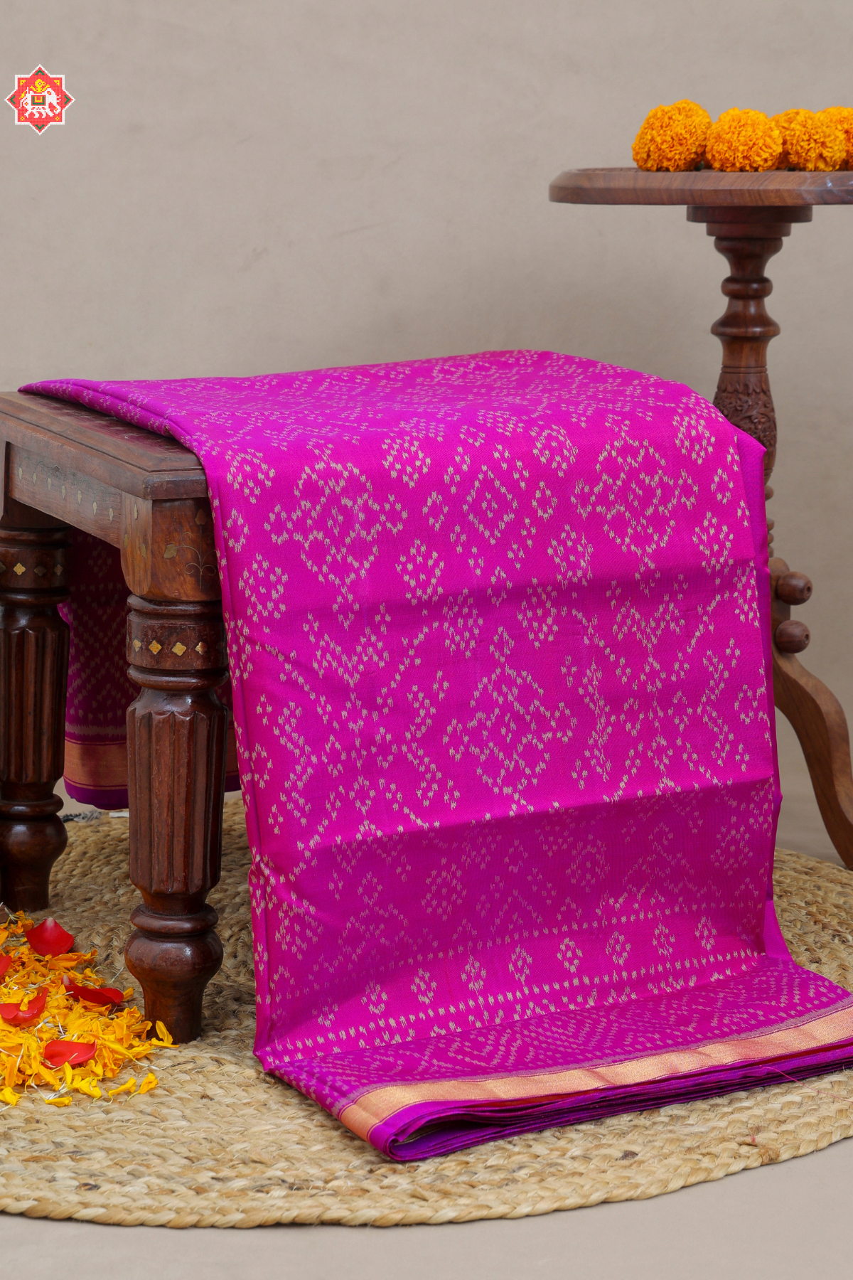 Navratna design small tissue border single ikat patola saree