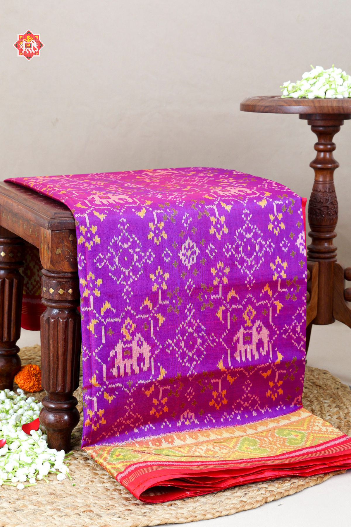 Navratna design with elephant tissue border single ikat patola saree