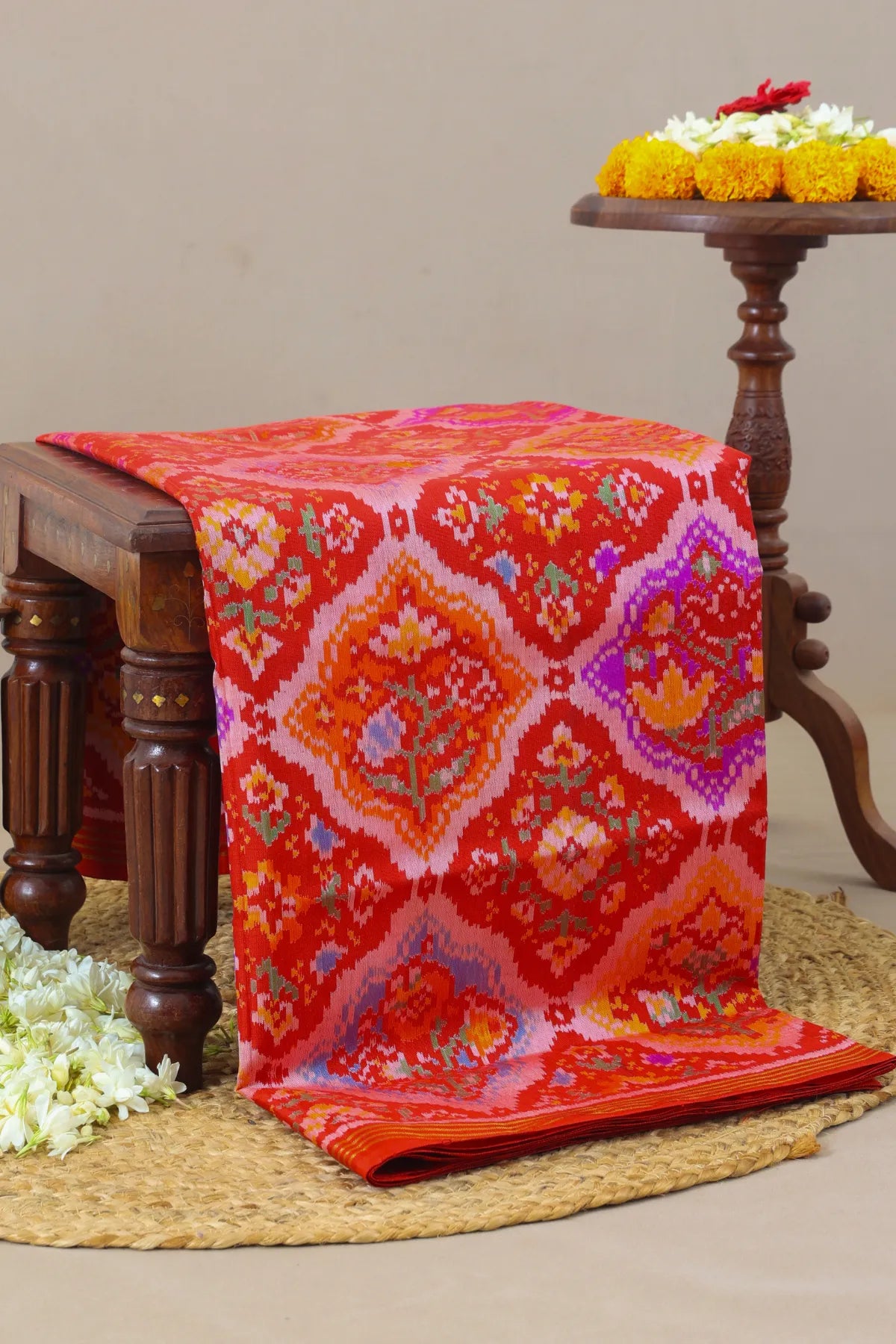 Stylis floral design with small border semi double ikat patola saree