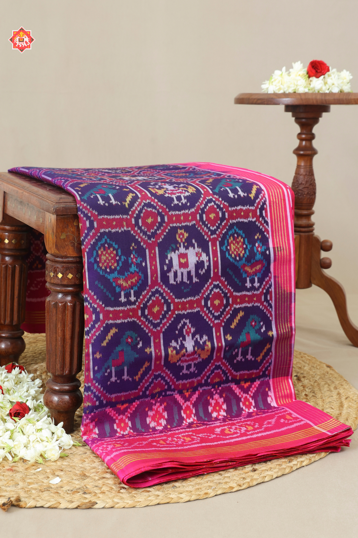 Small chabdi with motif design & ghughroo border semi double ikat patola saree