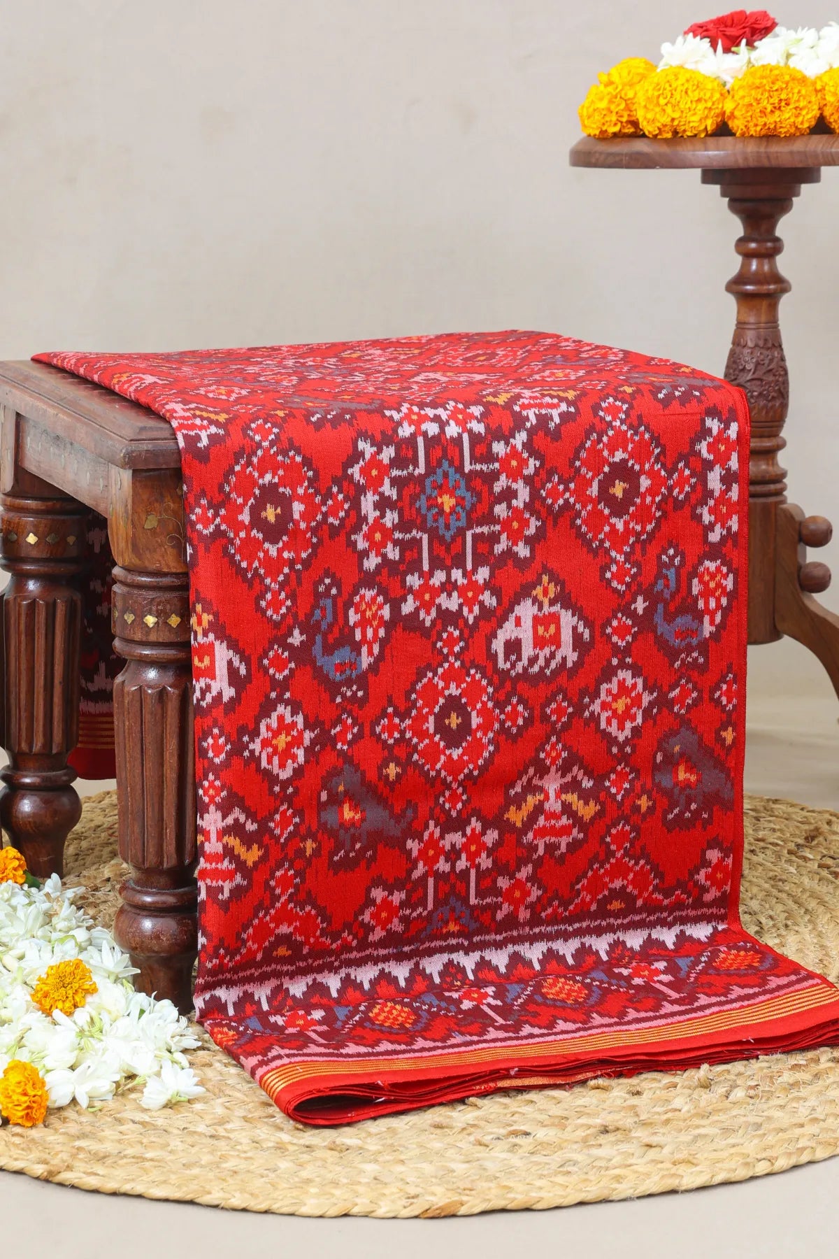 Traditional navratna with motifs design palllu border flowers design semi double ikat patola saree