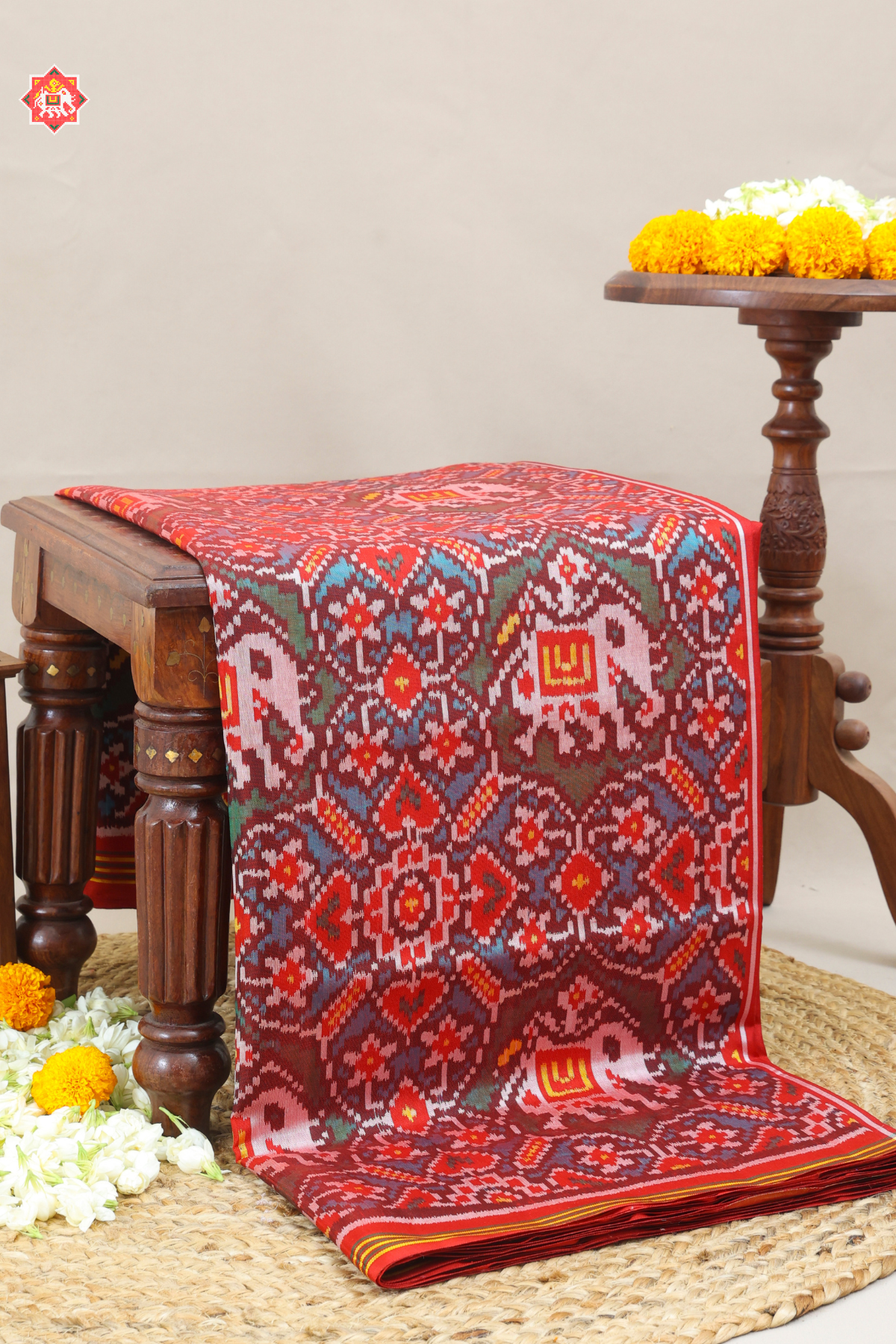 Maneck chowk design with elephant small lines border semi double ikat patola saree
