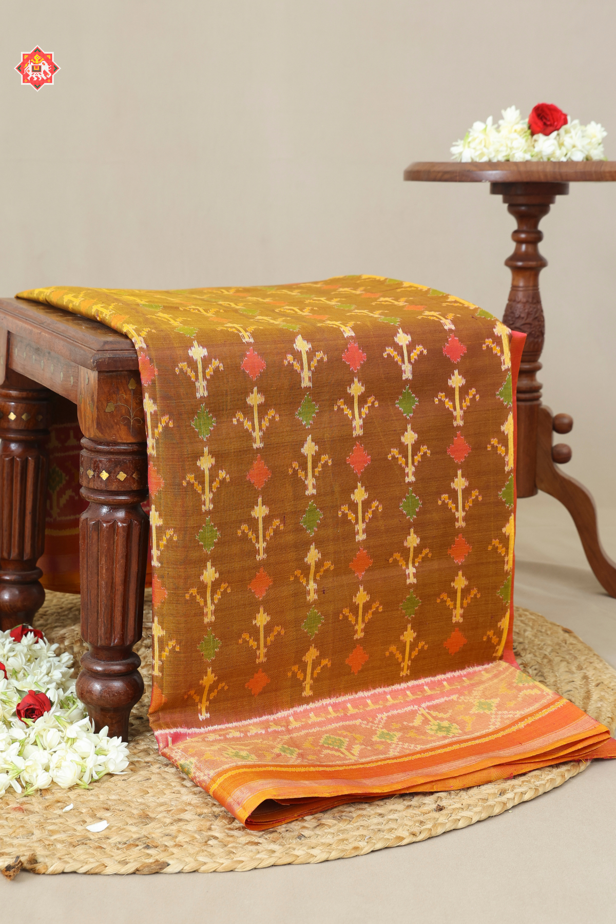 Fancy flowers design with ghughroo border single ikat patola saree