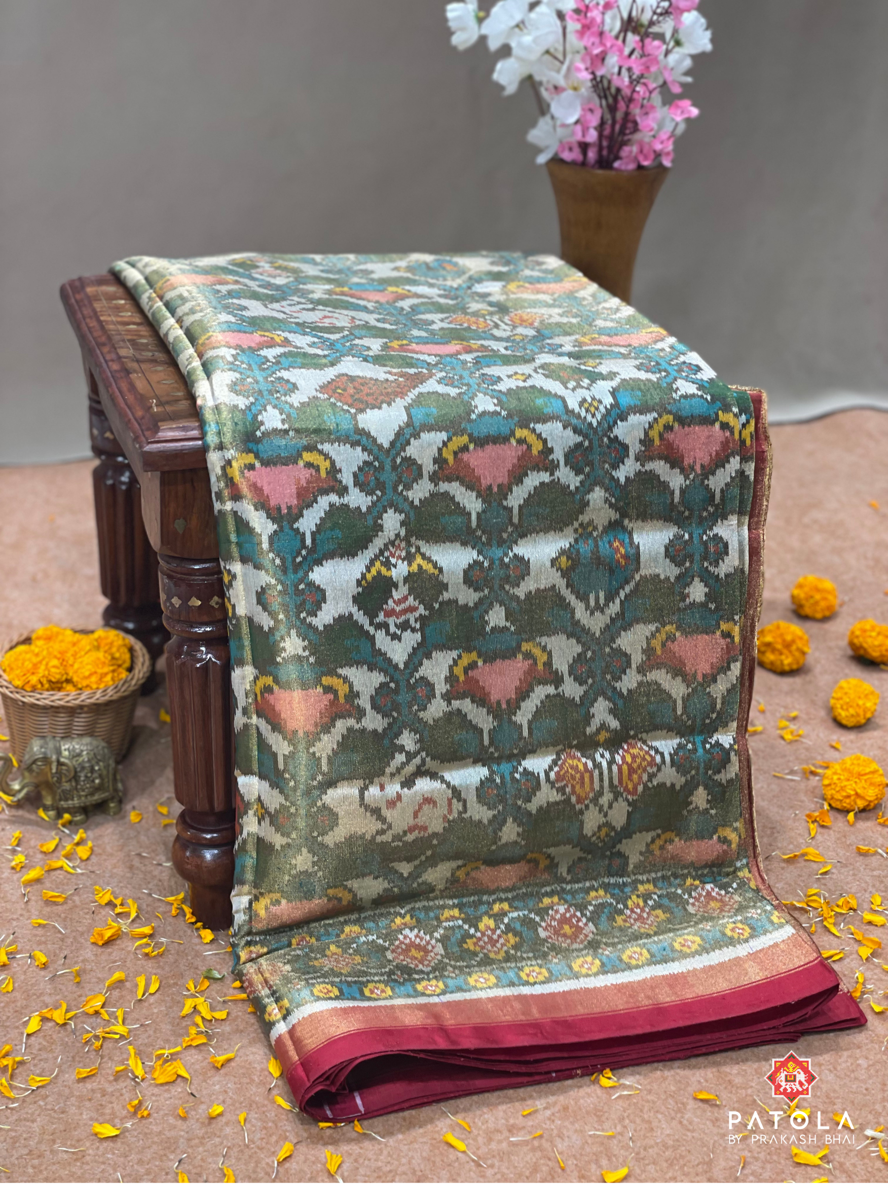 Small Figures With New Designer Tissue Patola Saree