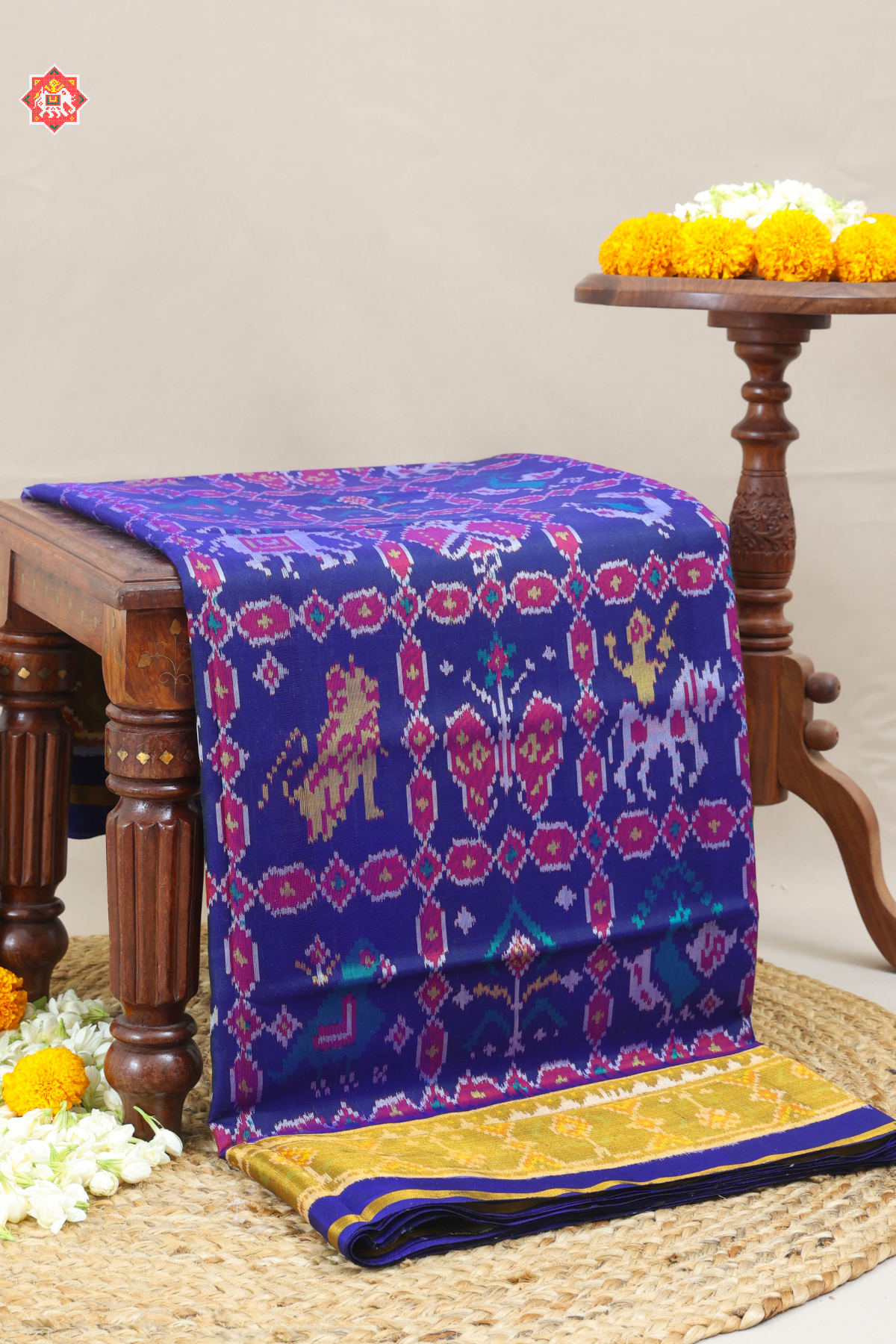 Maserpiece 9 motif design with tissue border single ikat patola saree